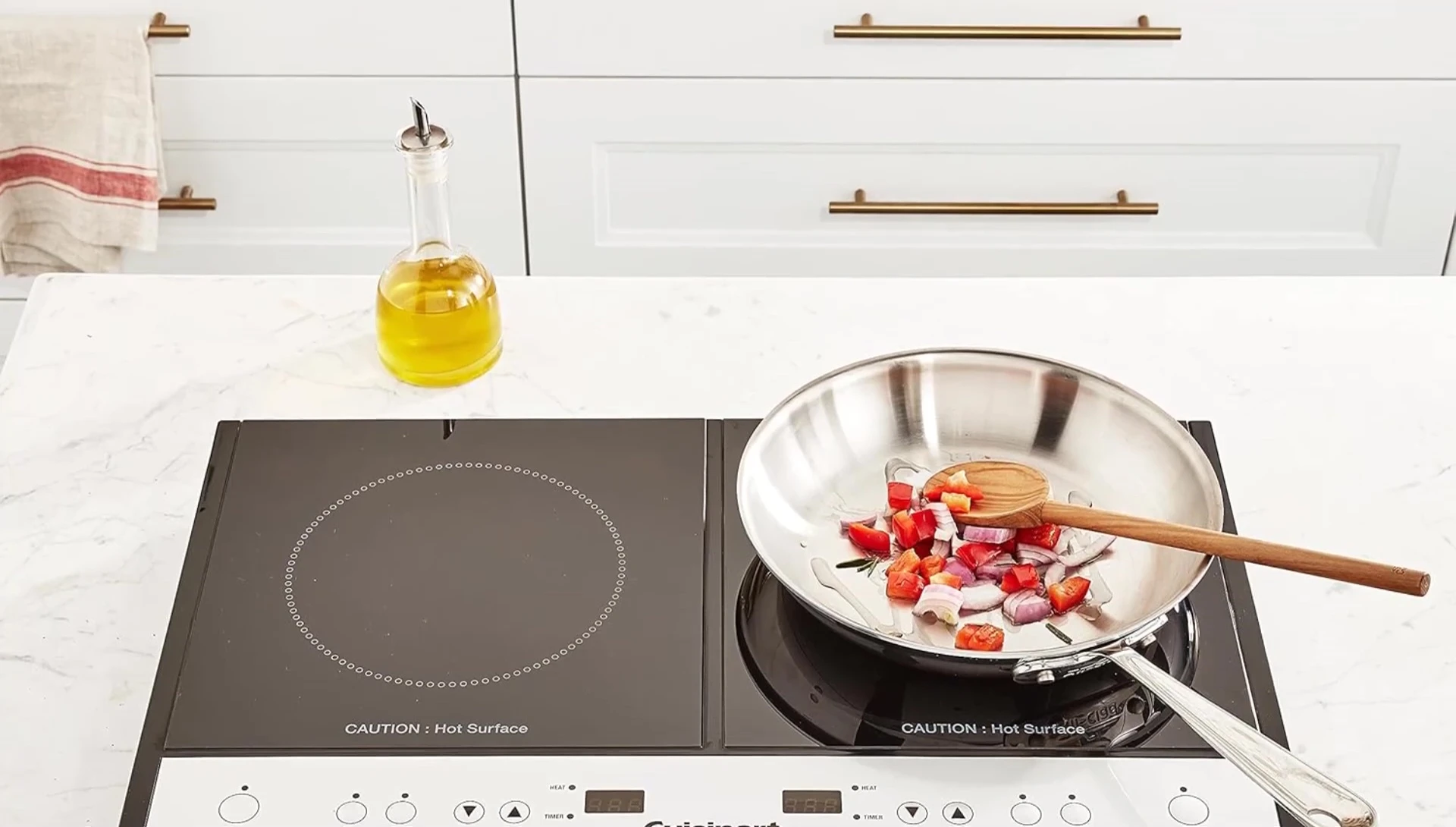 Close-up on the control panel of the Quiser double induction cooktop