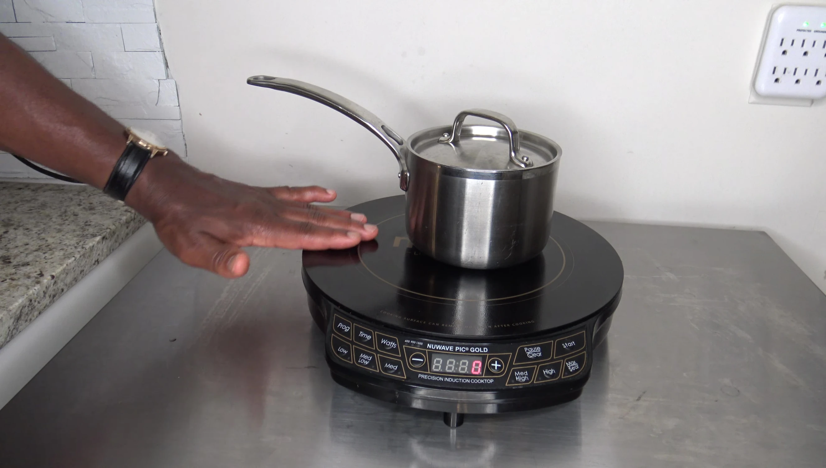 The cooktop surface, highlighting the glass coating