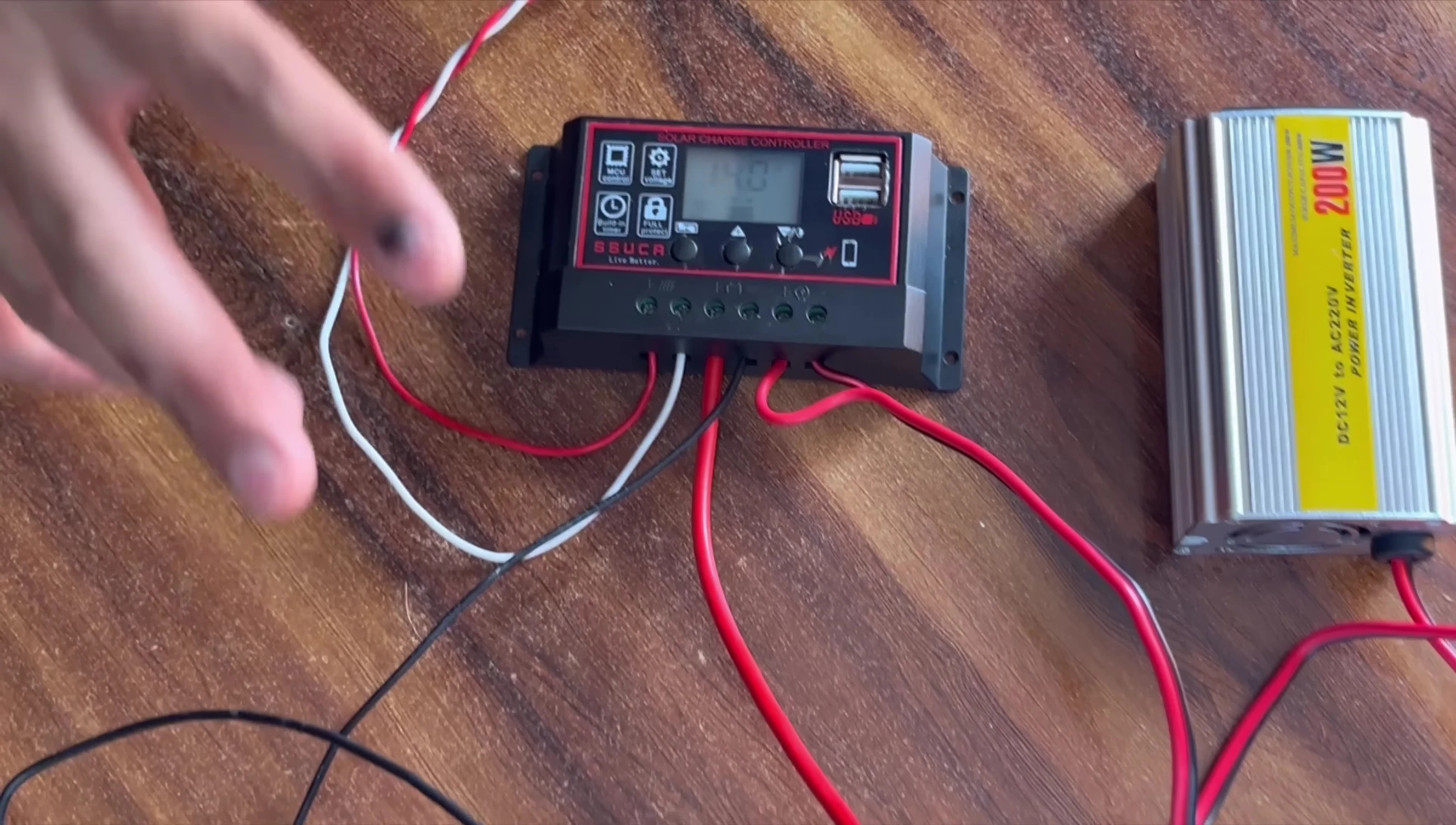 Completed connections of the solar panel, battery, and inverter