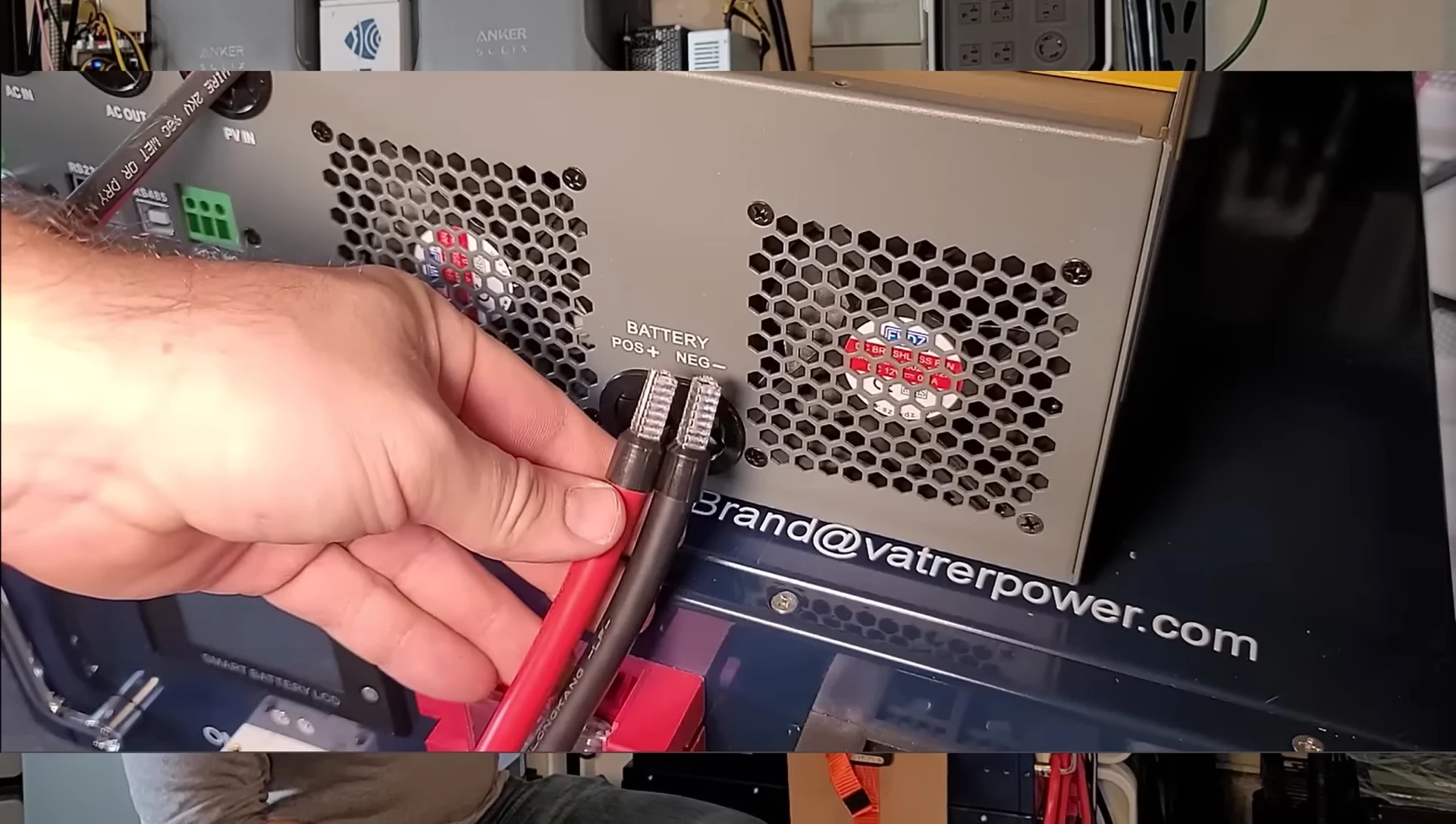 The presenter showing a DIY solar generator.