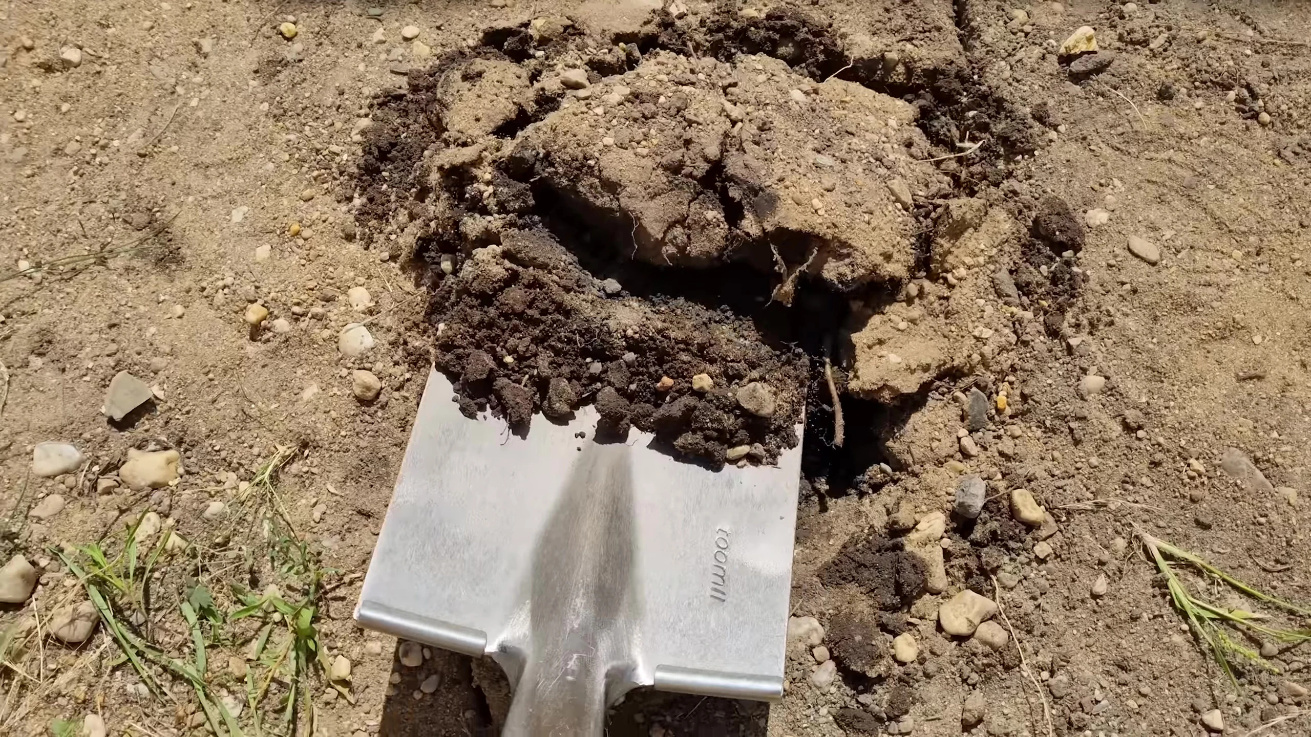 Digging the hole and preparing the concrete base for the generator's mounting.
