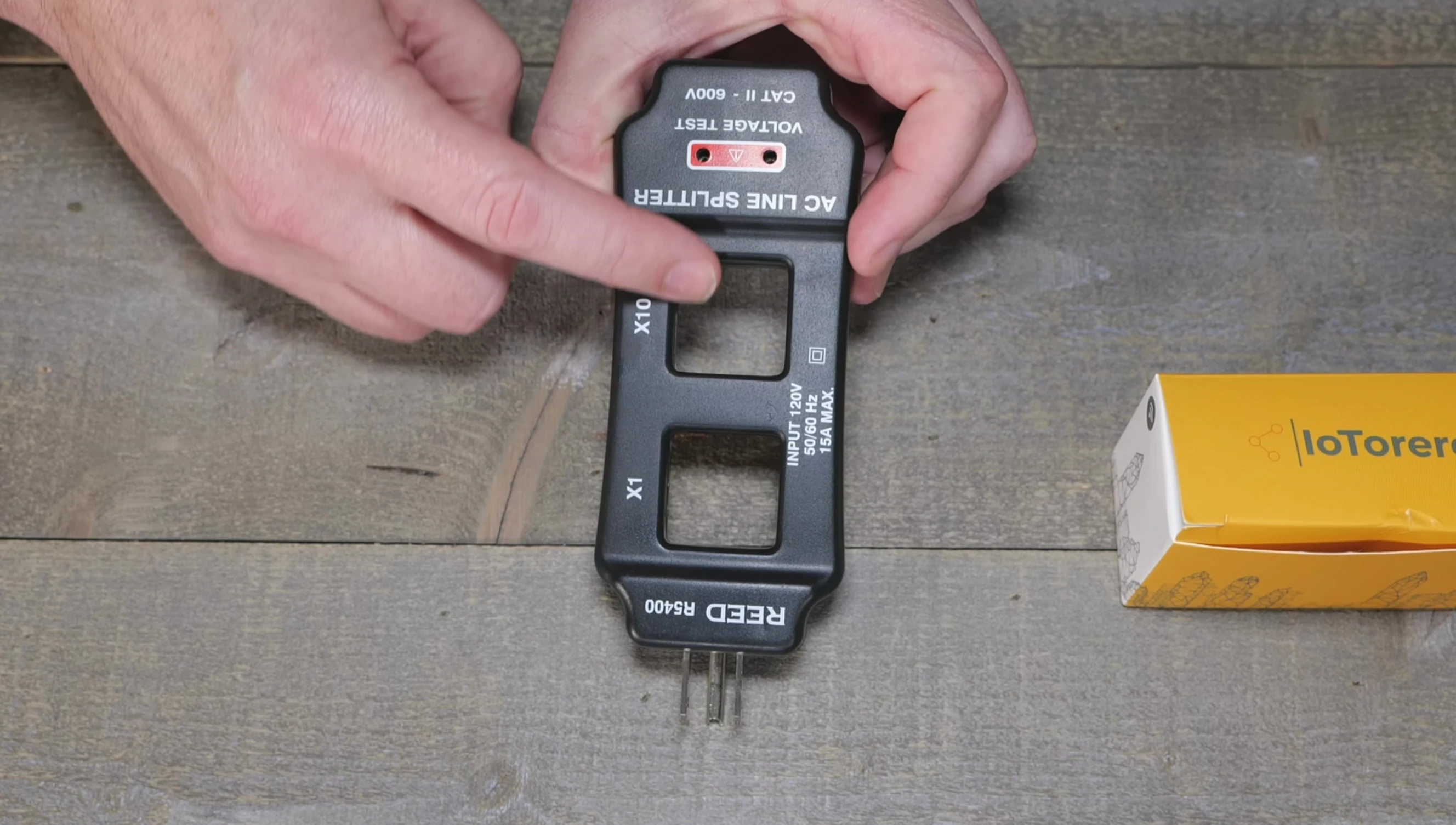 Image of a power monitoring tool with CT clamp