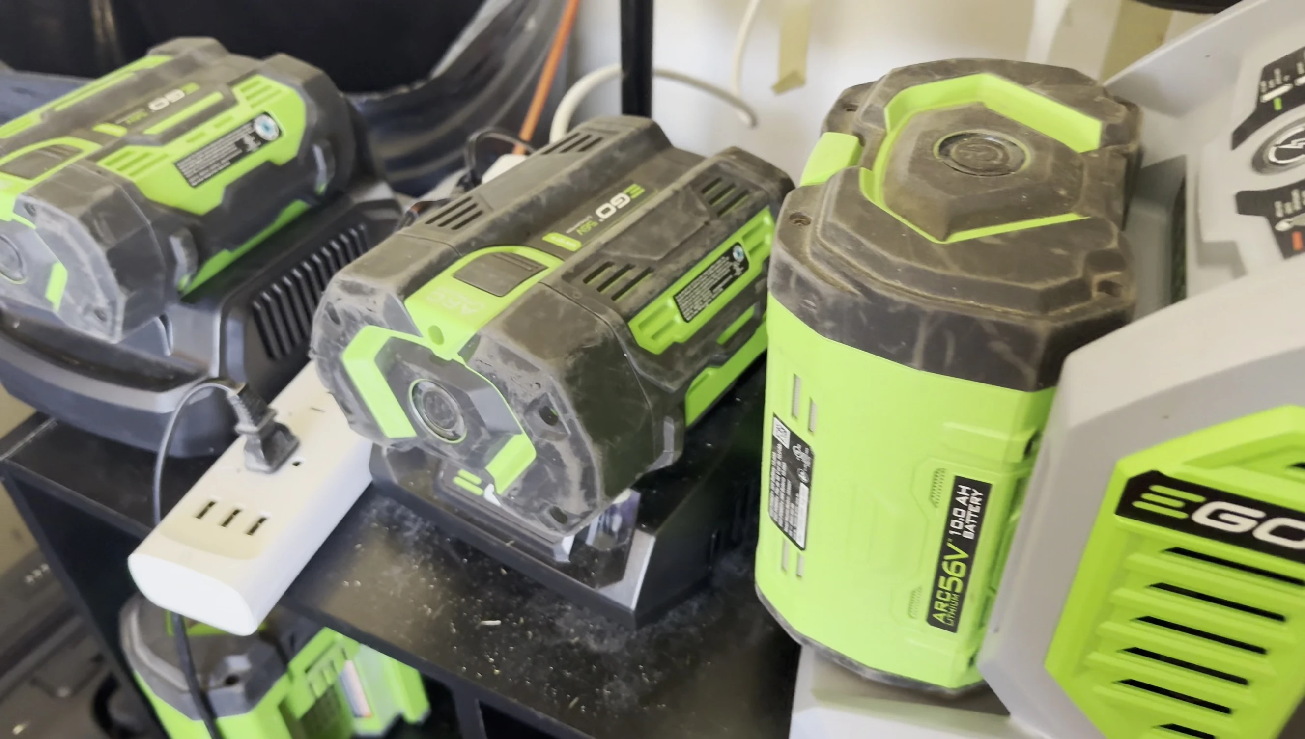 EGO batteries charging on the power strip