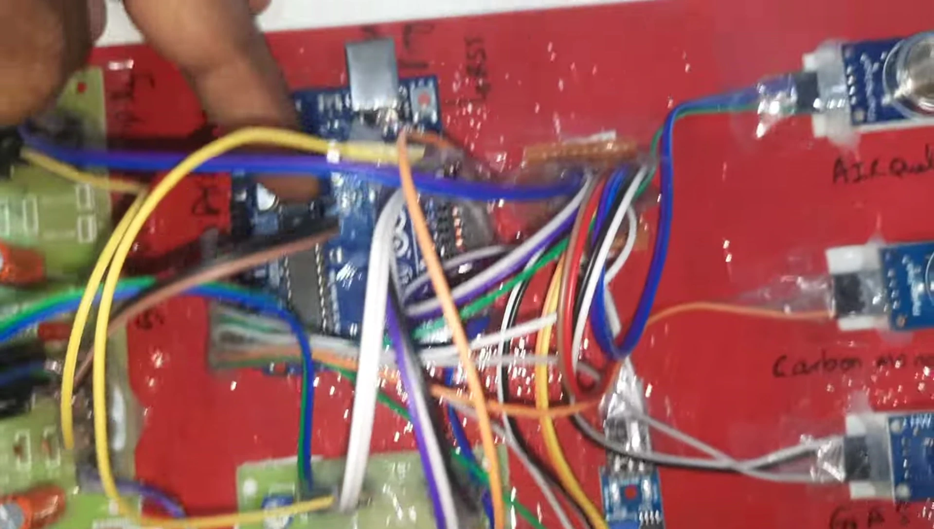 The Arduino Uno R3 board, the LCD display, and the Max232 converter.