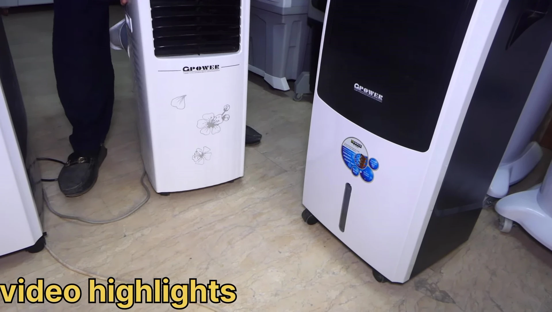 Someone demonstrating the portability of the AC between rooms