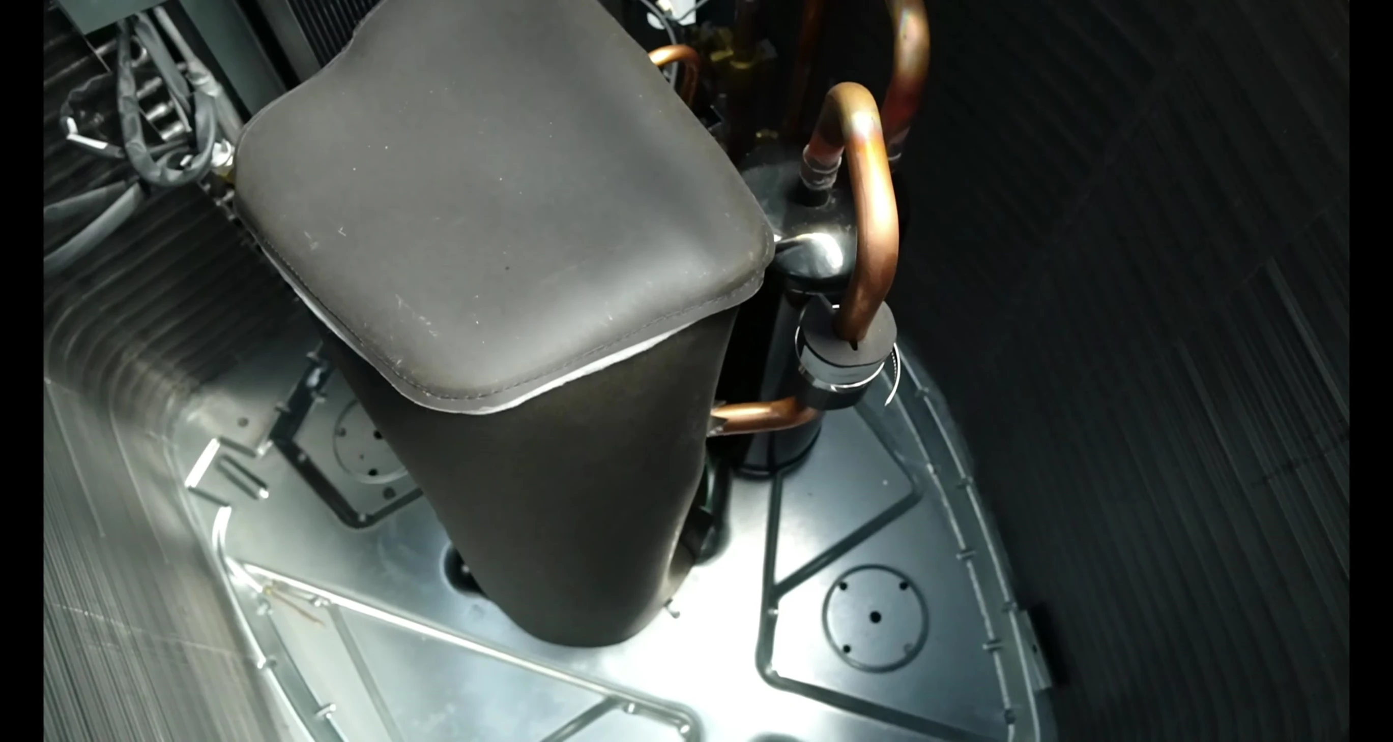 Screenshot showing the larger condenser coil of the higher-priced system.