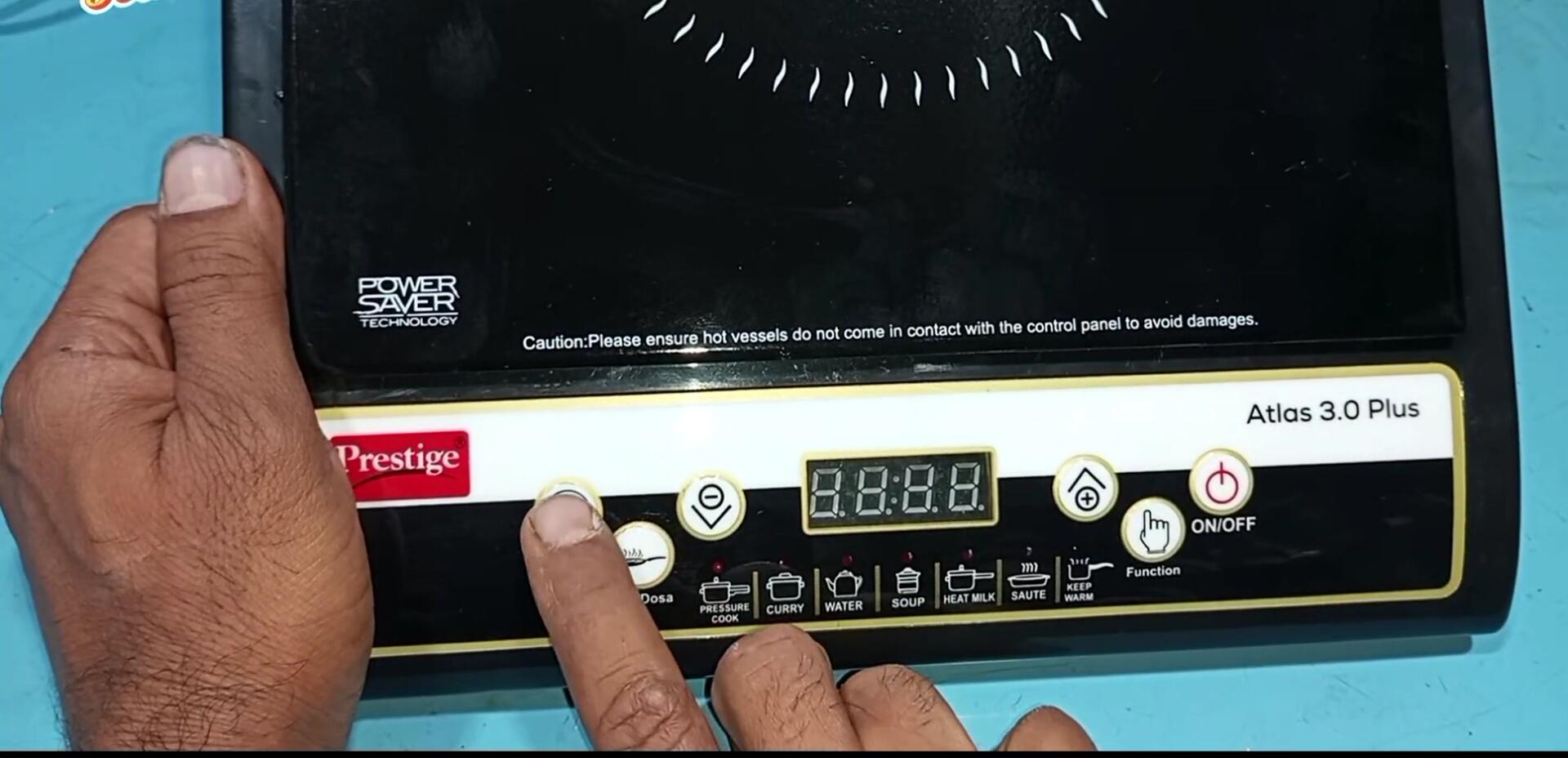Timer button on the control panel.
