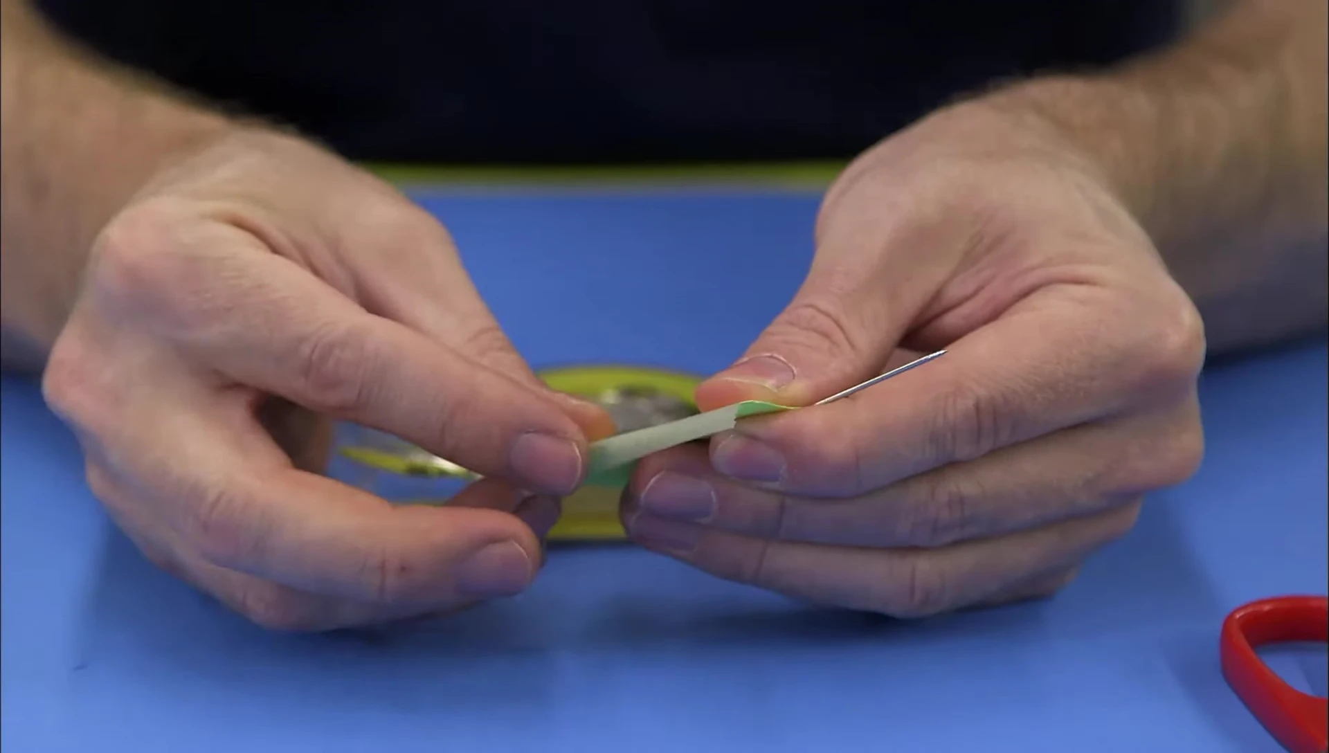 The folding and taping of the index card strips to create the turbine blades