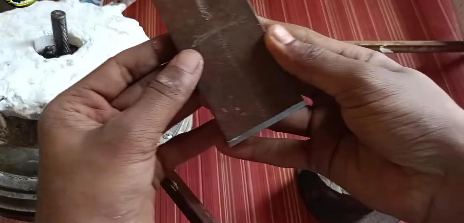Dynamo mounting using a metallic piece