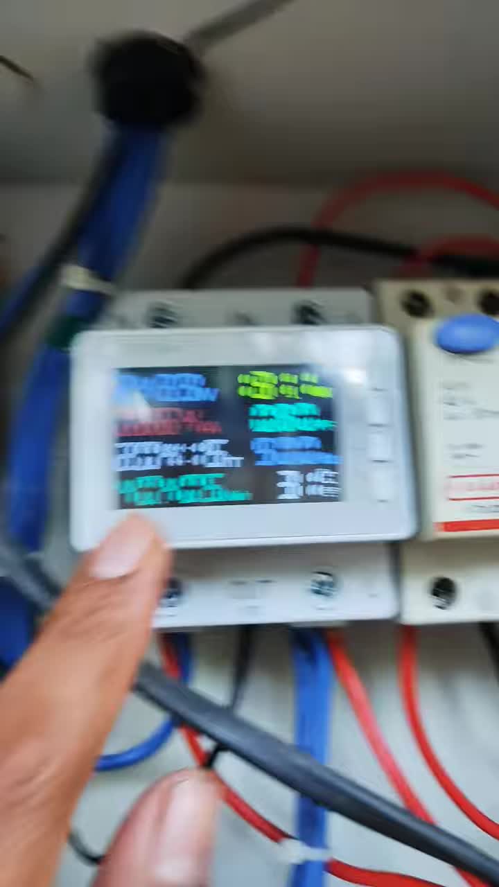 Screenshot showing the energy meter display with voltage, wattage, and other readings.