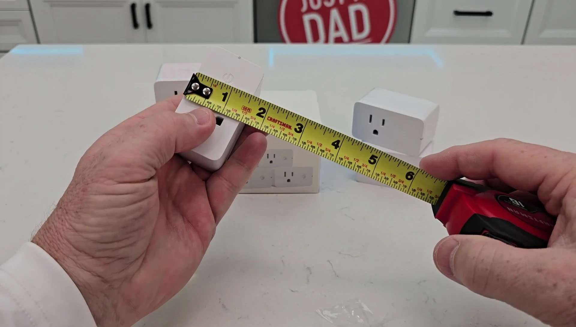 The Govee smart plug showing its size and three-prong design.