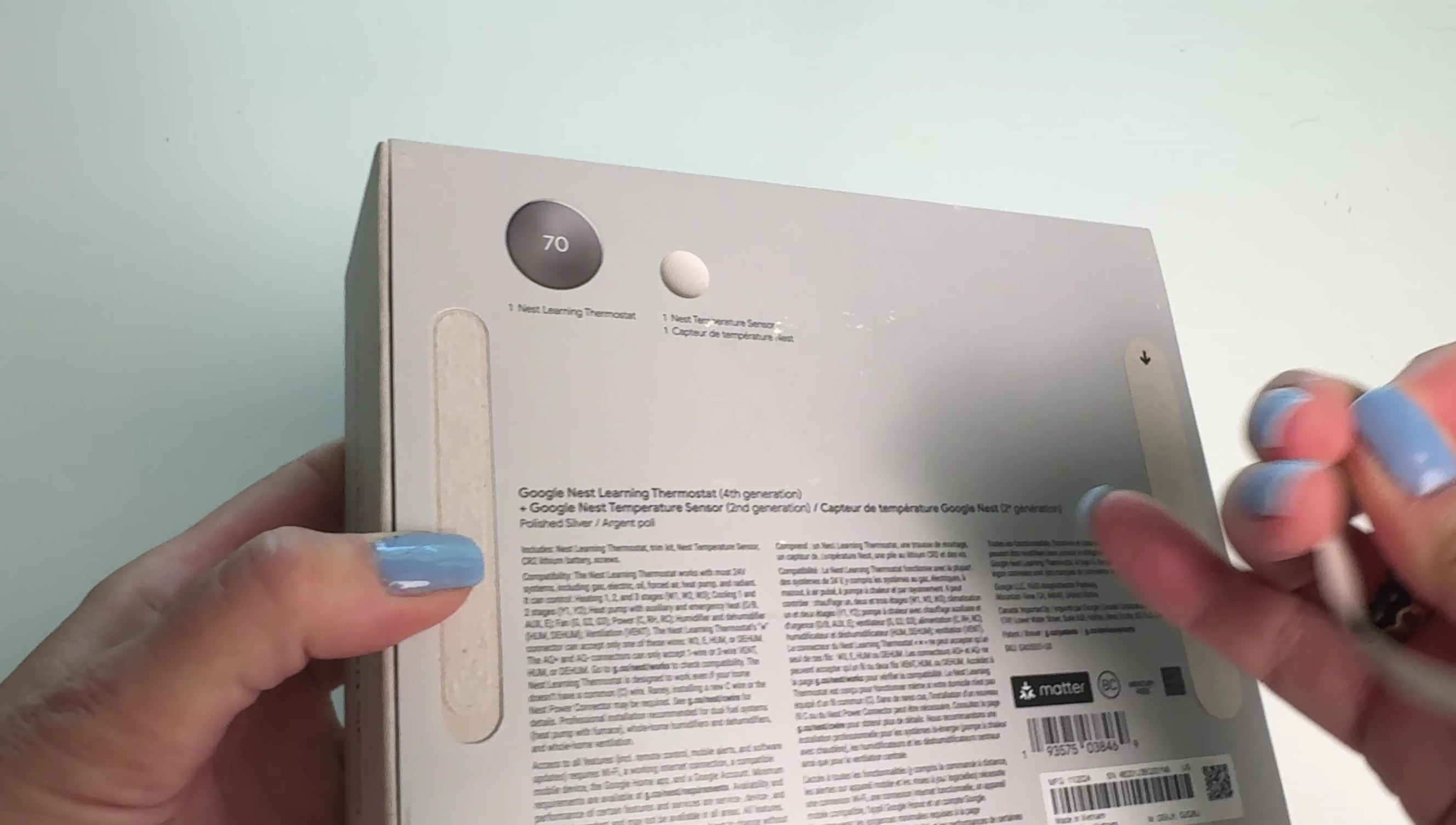 Unboxing the Nest Learning Thermostat 4th generation, showing the contents.