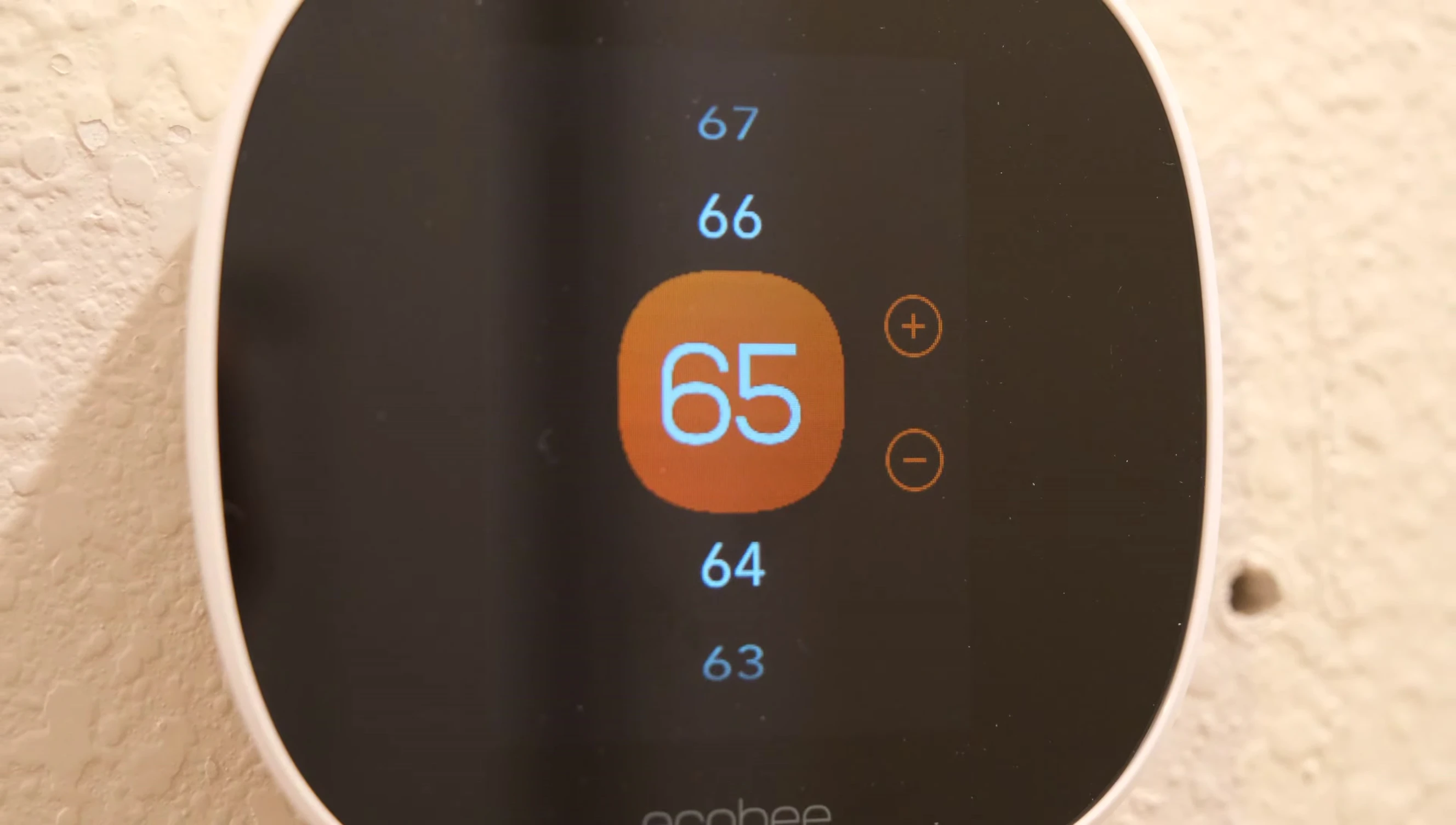 The display of the Ecobee Smart Thermostat Essential showing the current temperature and settings.