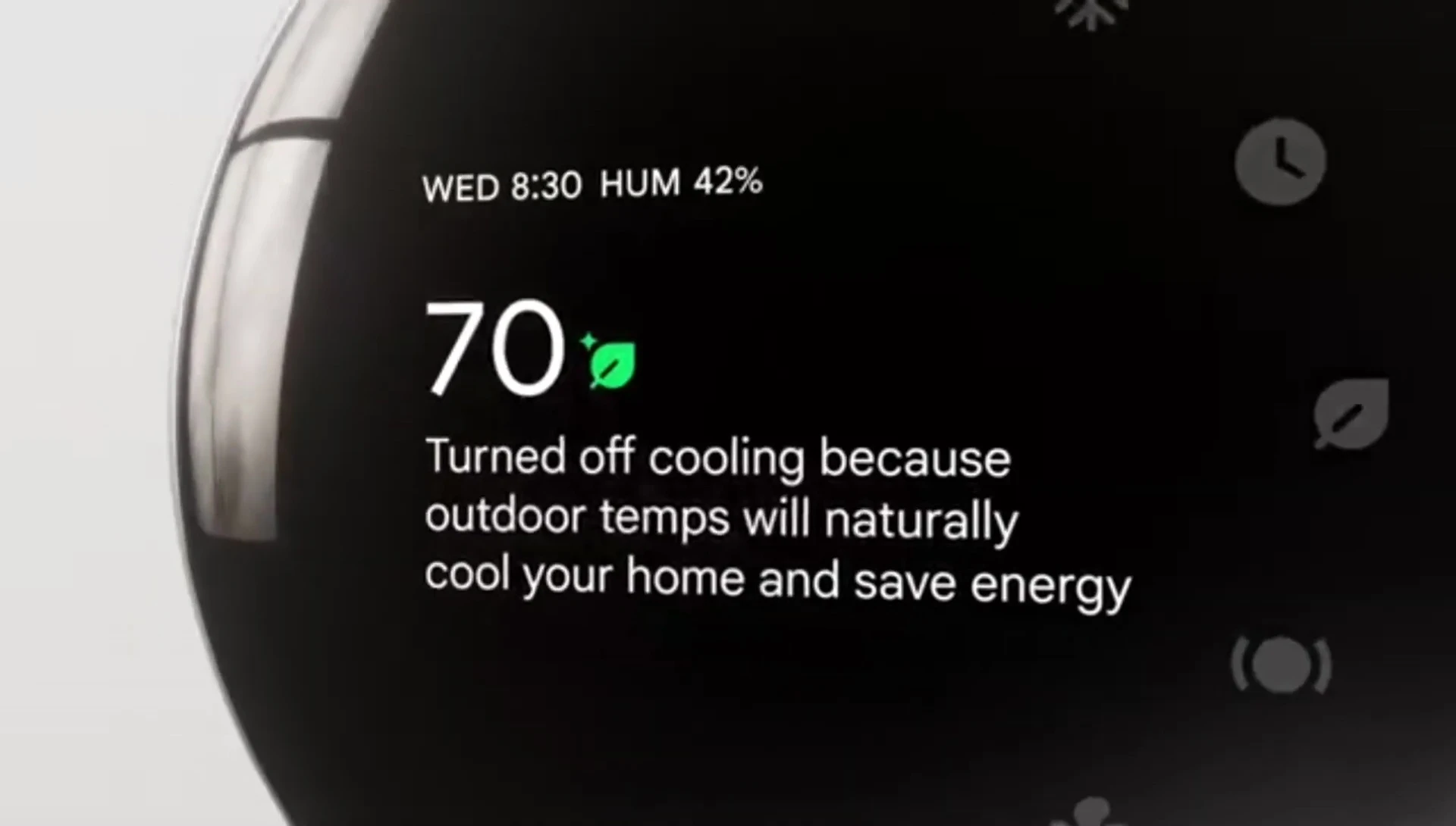 Close-up of the Nest Learning Thermostat interface showing AI features