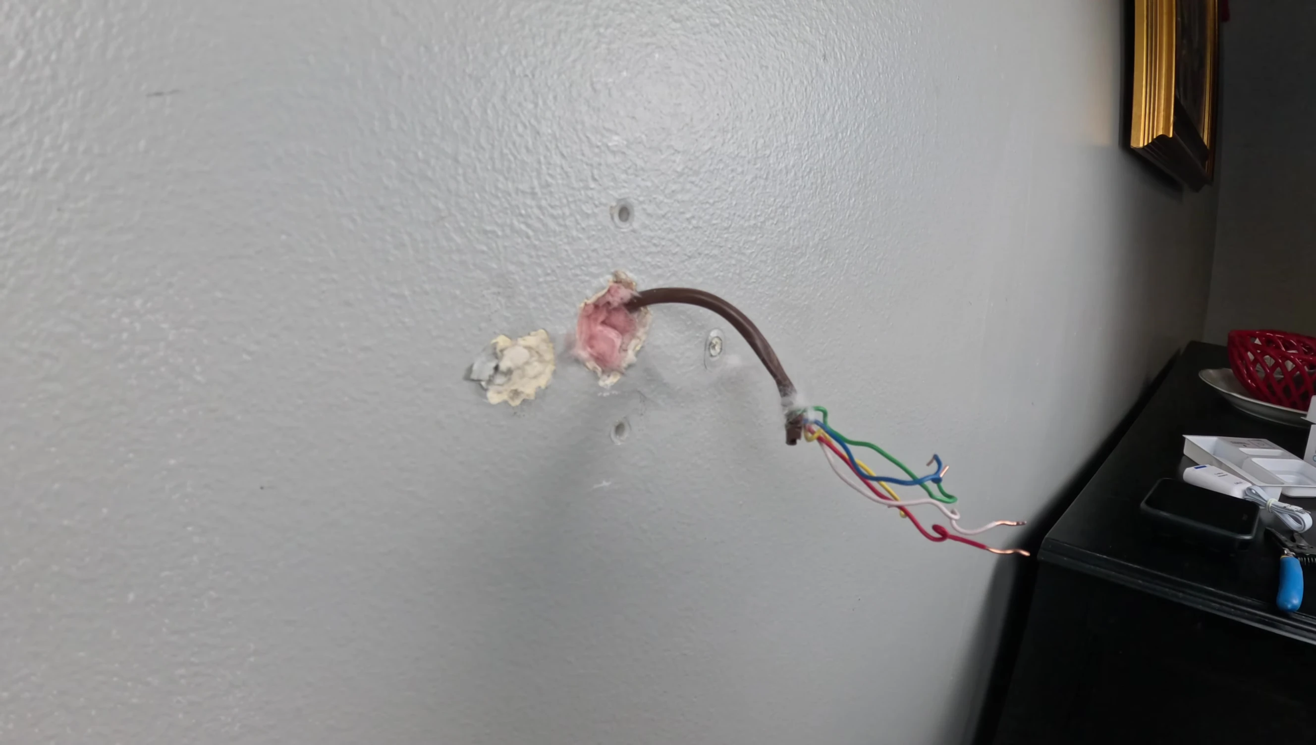 Connecting the wires to the new thermostat