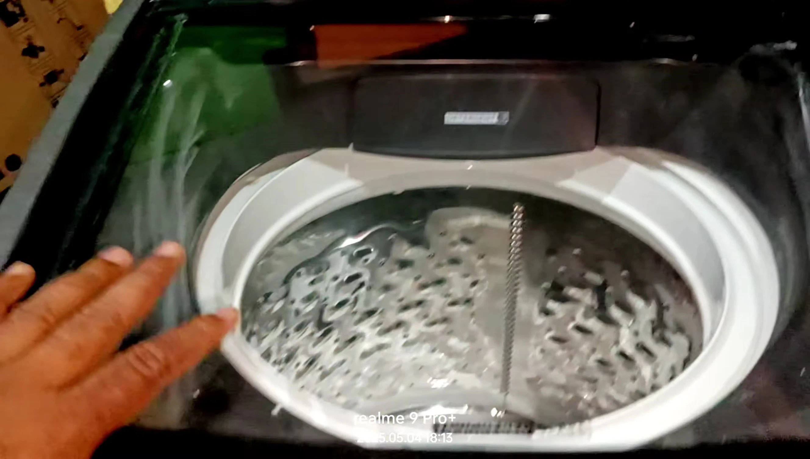 The reviewer mentions the Samsung washing machine as a point of comparison.