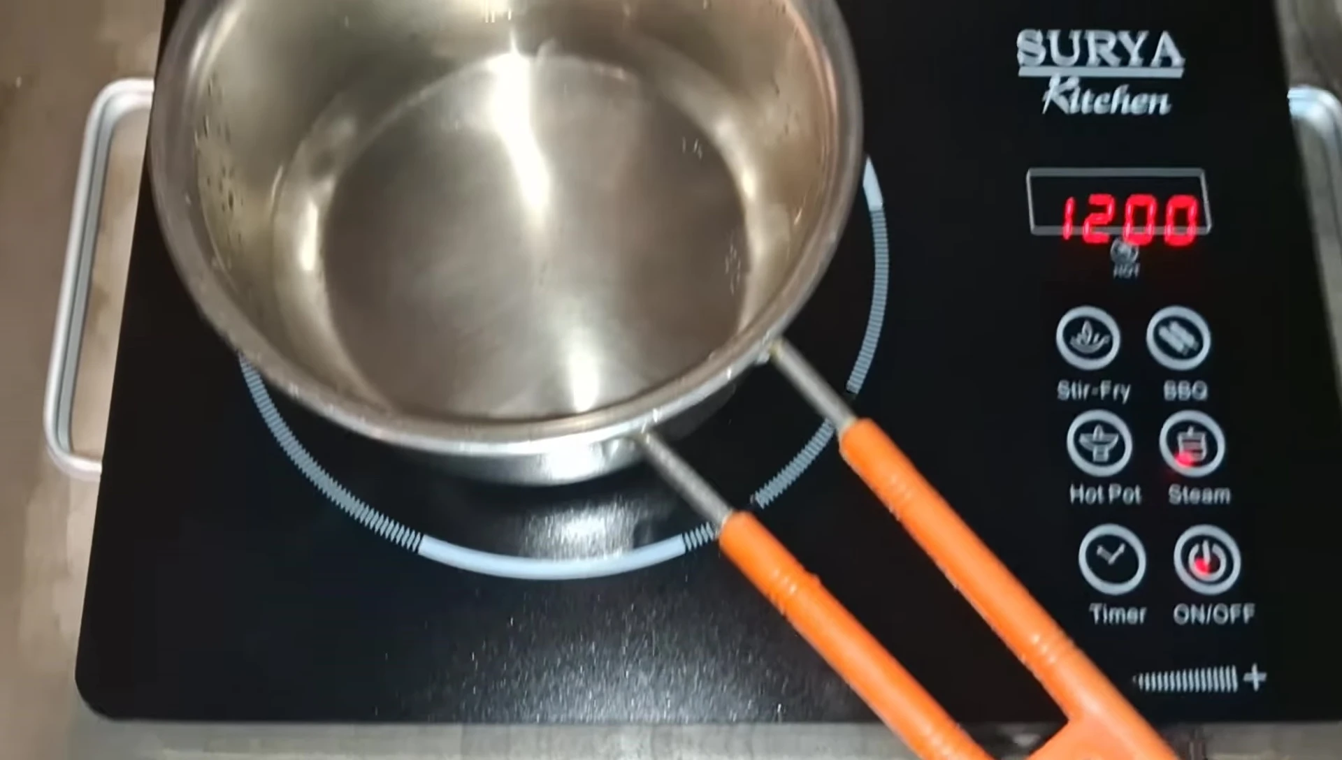 Water heating up on the Surya infrared cooktop.