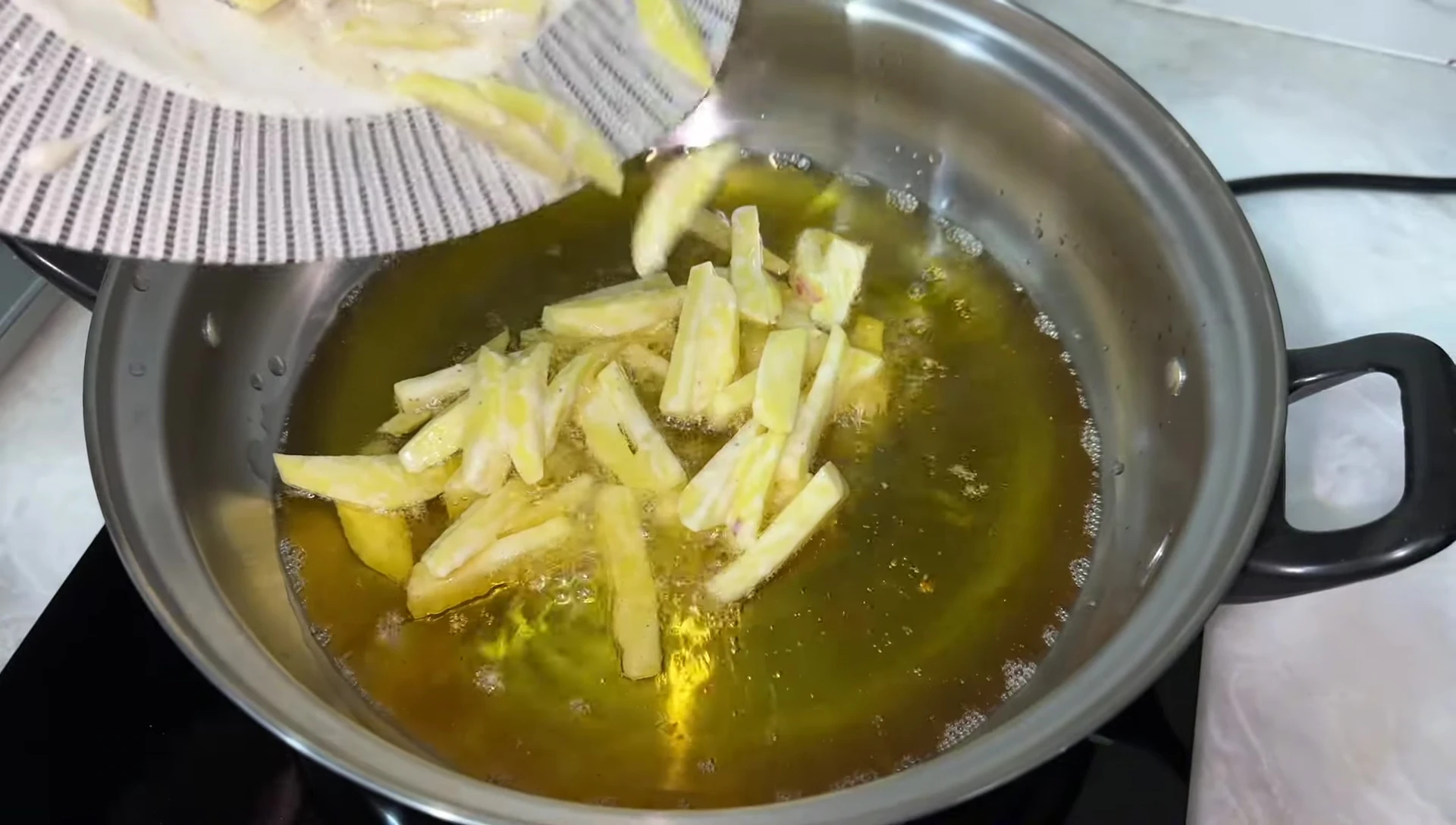 Potato chips being fried