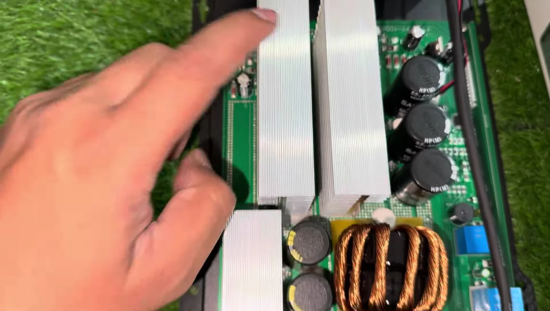 Close-up of the internal components, including heat sinks and MOSFETs