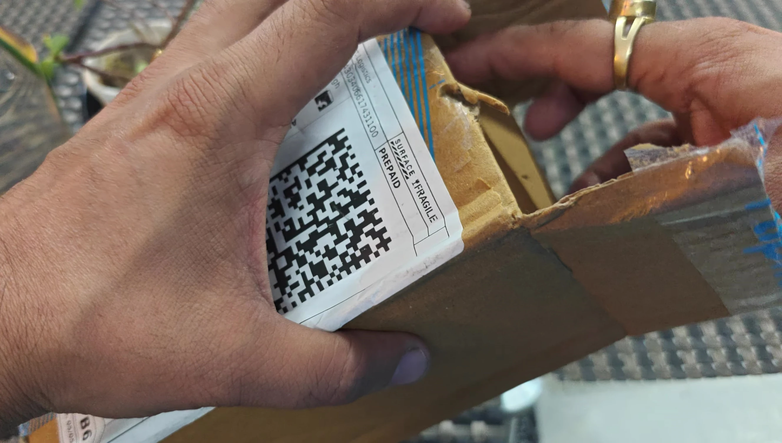 The Wipro Smart Plug box being opened, revealing the product inside.