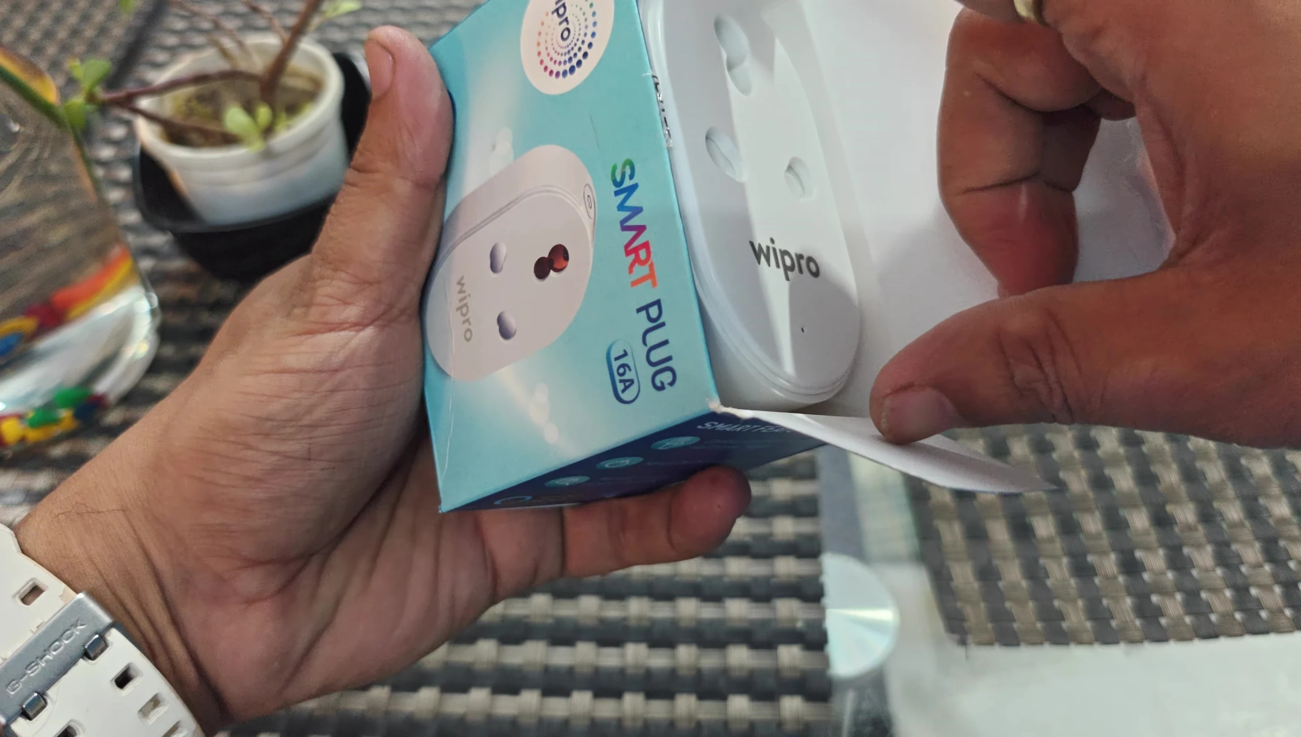Close-up shot showcasing the physical design and build quality of the Wipro Smart Plug.