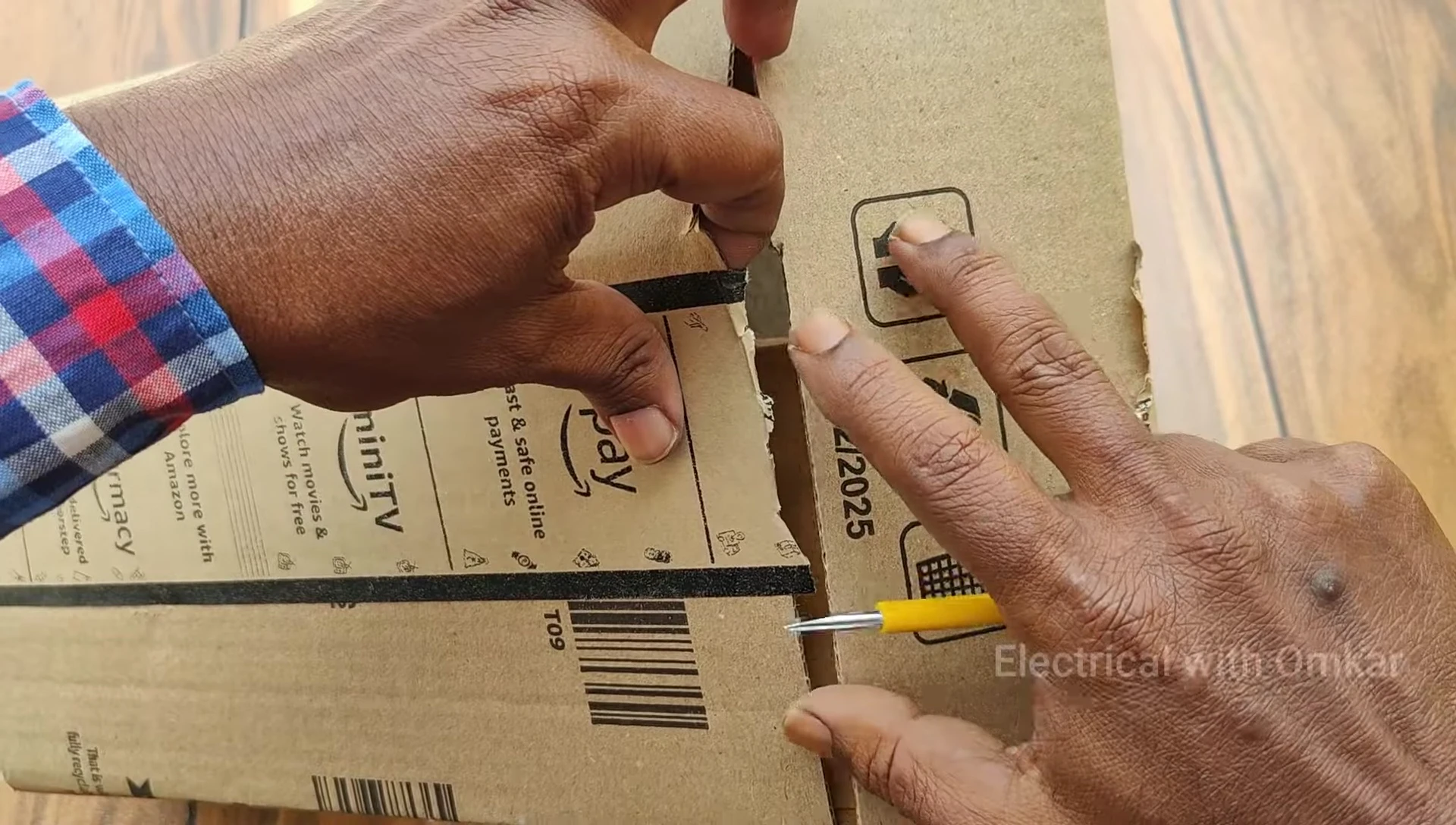 The outer cardboard box containing the smart extension board.