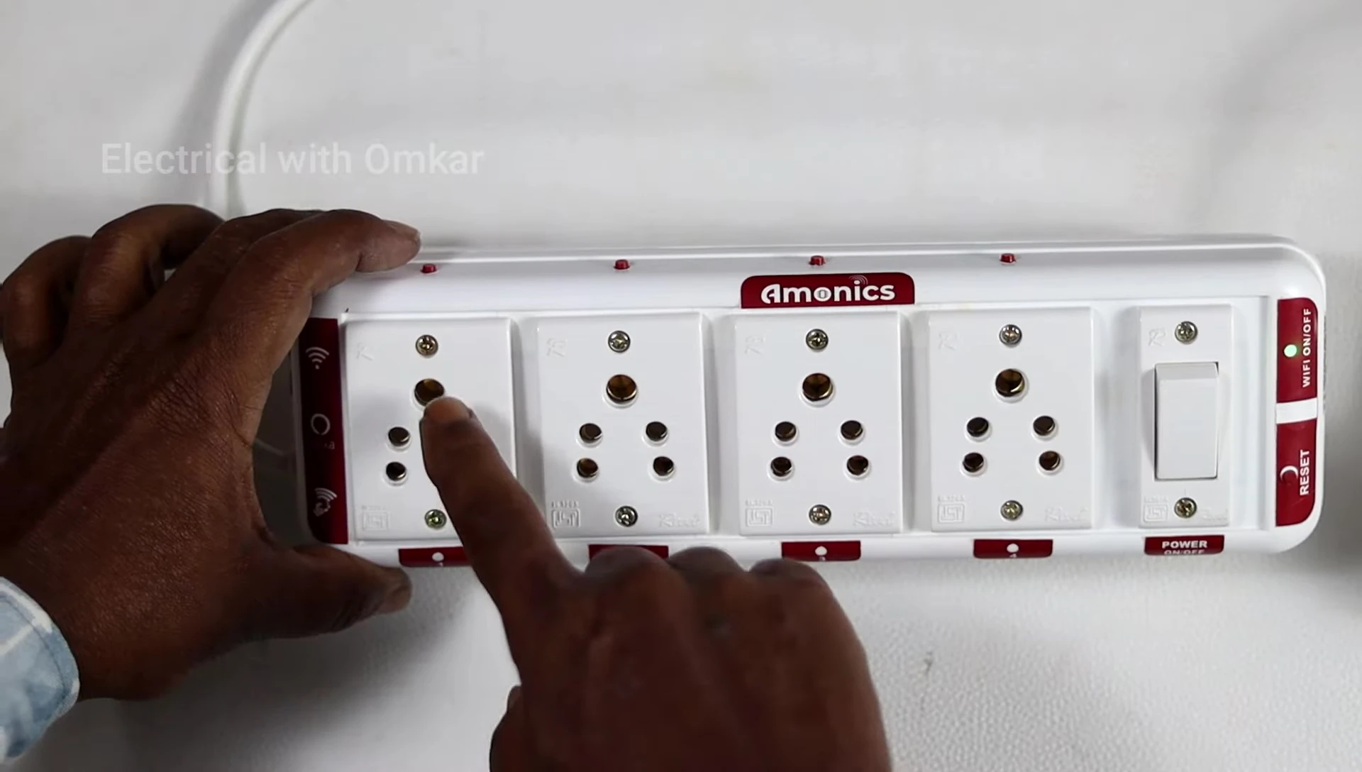 Using the manual switches on the smart extension board.