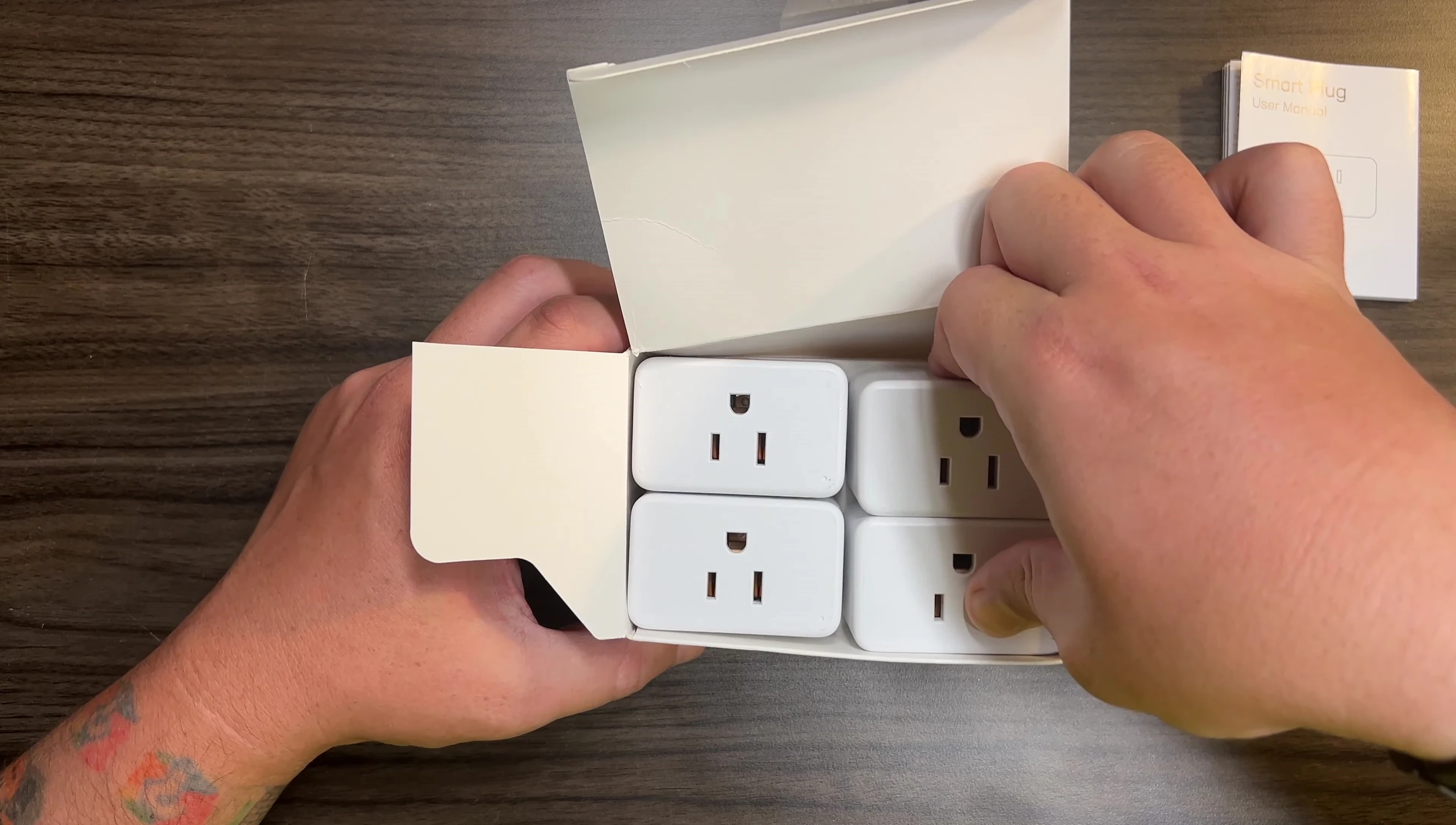 The four EIGHTREE Smart Wi-Fi plugs laid out