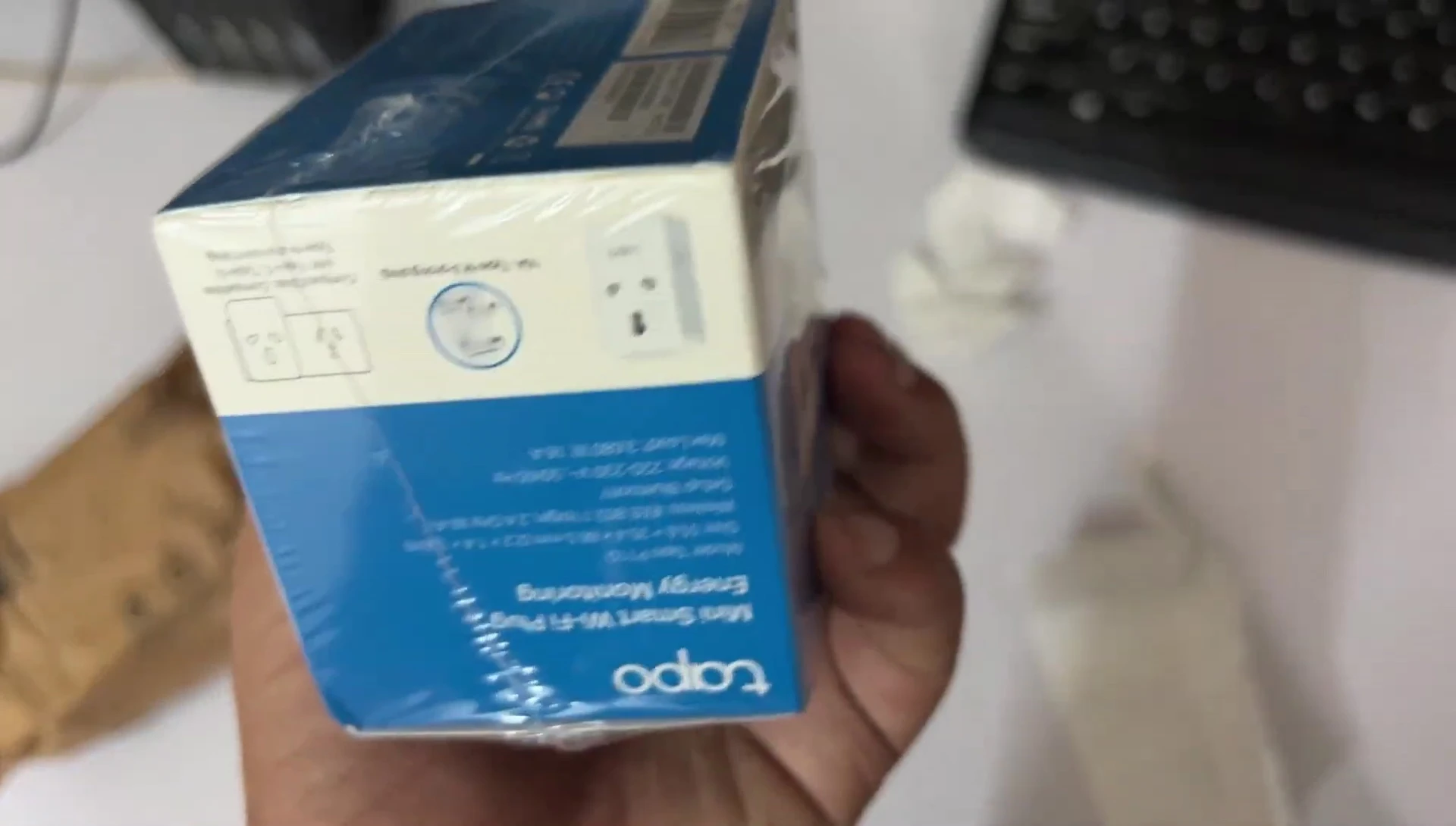 Close-up of the Tapo TP-Link P110 Smart Wi-Fi Plug packaging