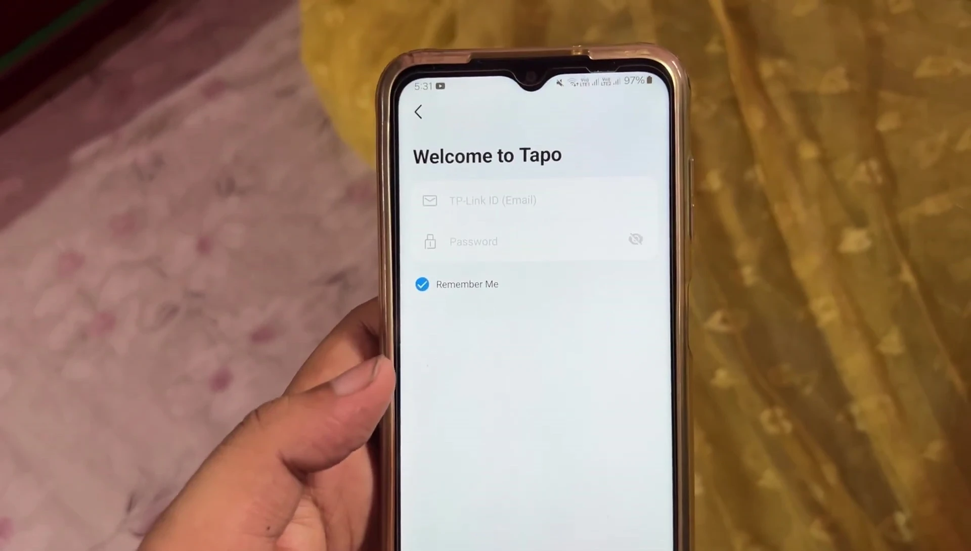 Smartphone screen showing TP-Link account login screen