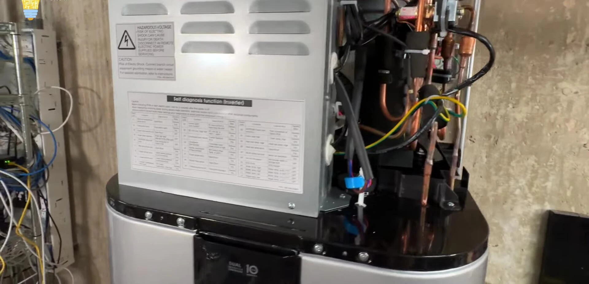 Disassembling the LG heat pump water heater for inspection