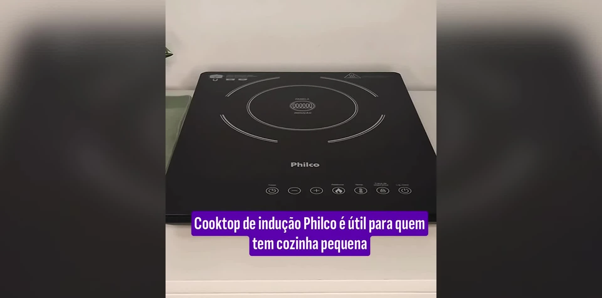 Close-up shot of the Philco PCT 12P induction cooktop showcasing its compact size.