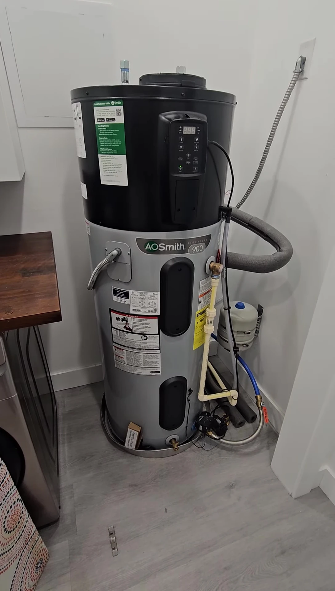 Speaker discussing the early failure of the heat pump