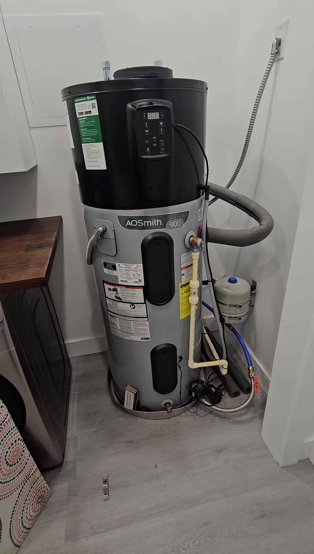 Speaker discussing the second failure of the heat pump after replacement