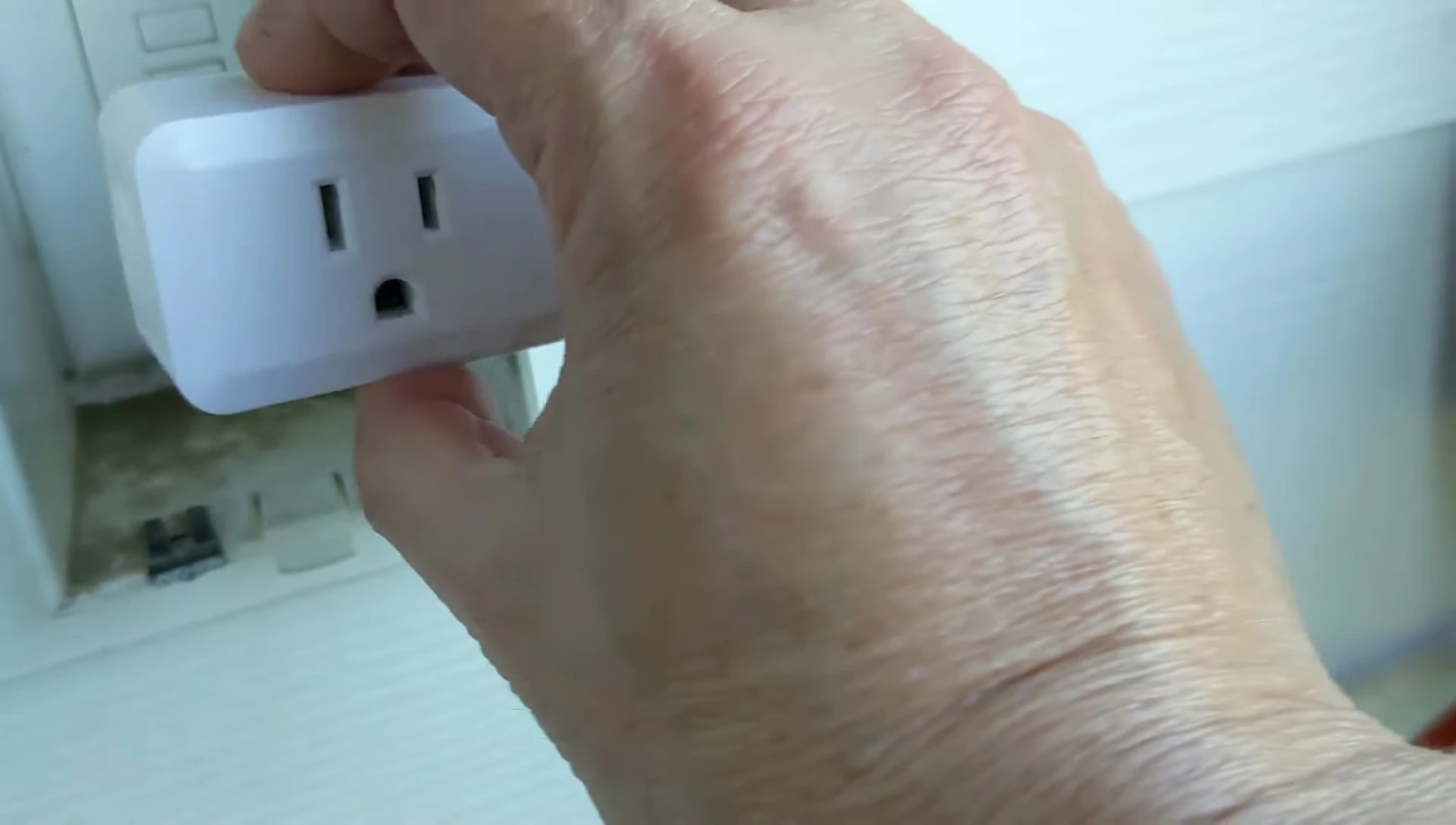Hand resetting the GFI plug after timer cutoff