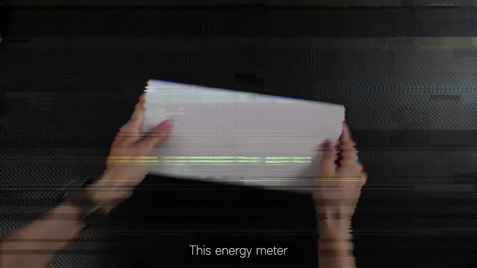 Close-up of the energy meter showing its front panel and display.
