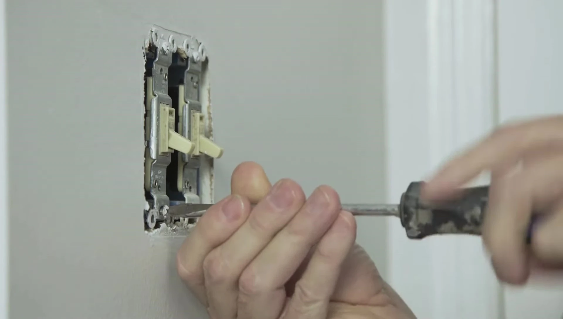Securing the new thermostat's base plate