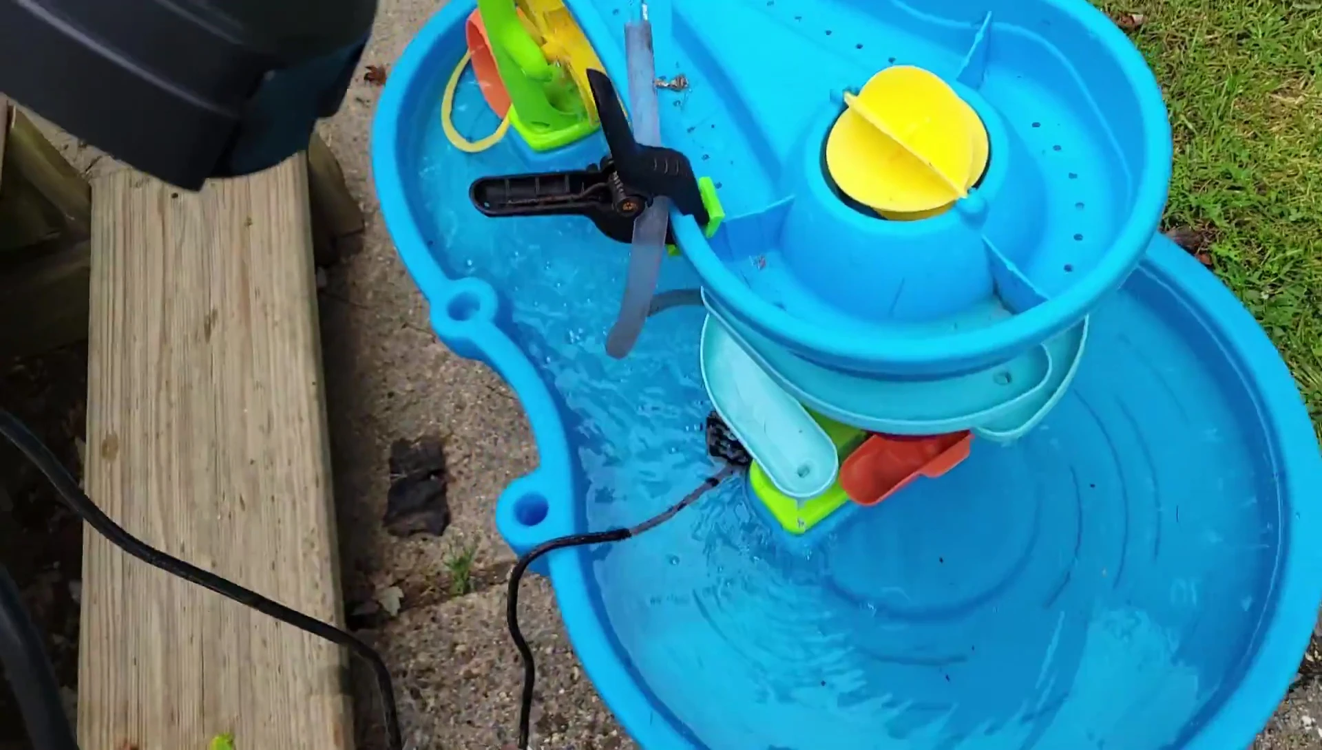The smart plug being submerged in water