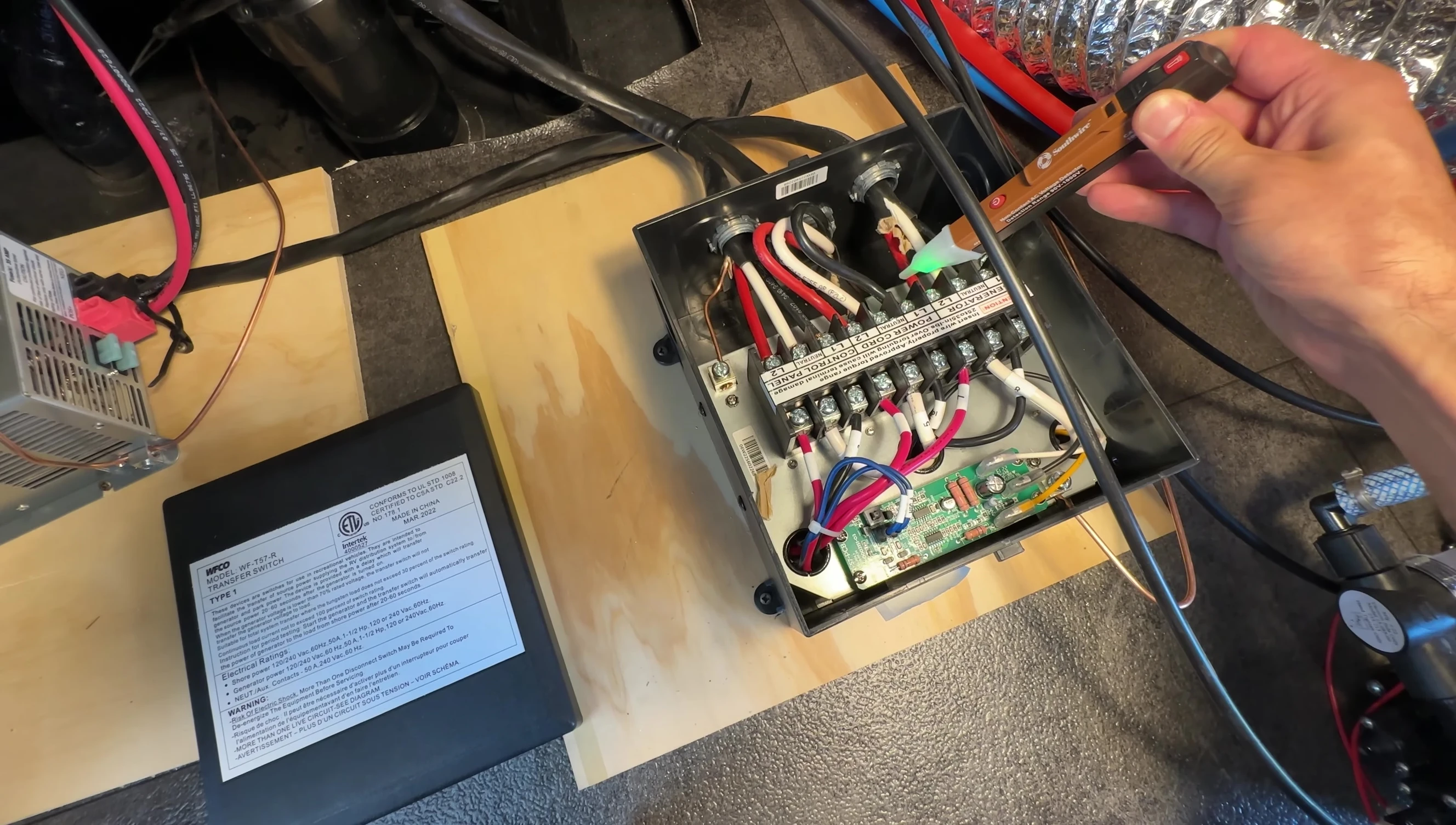 Disconnecting the automatic transfer switch to simplify wiring.