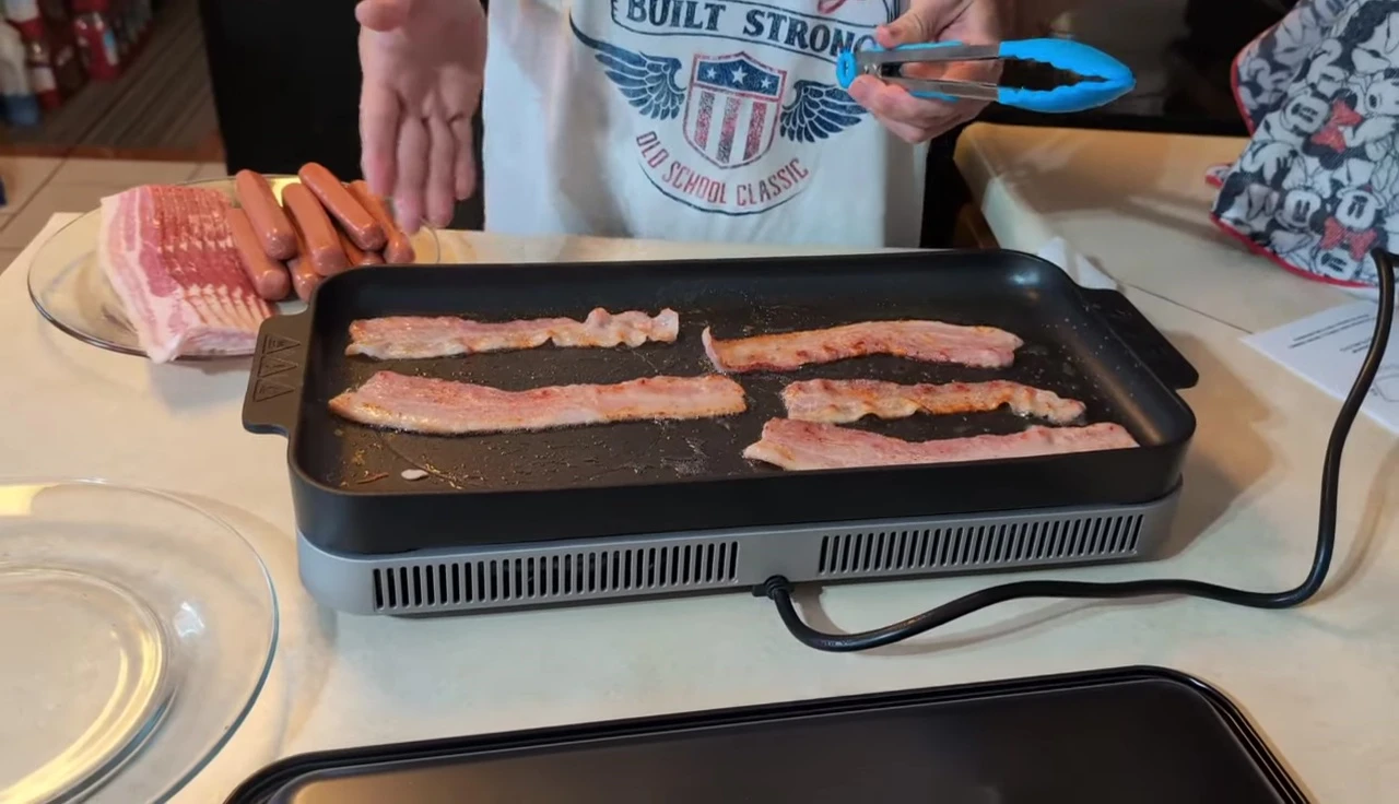 The cooktop in use showing dual-zone cooking