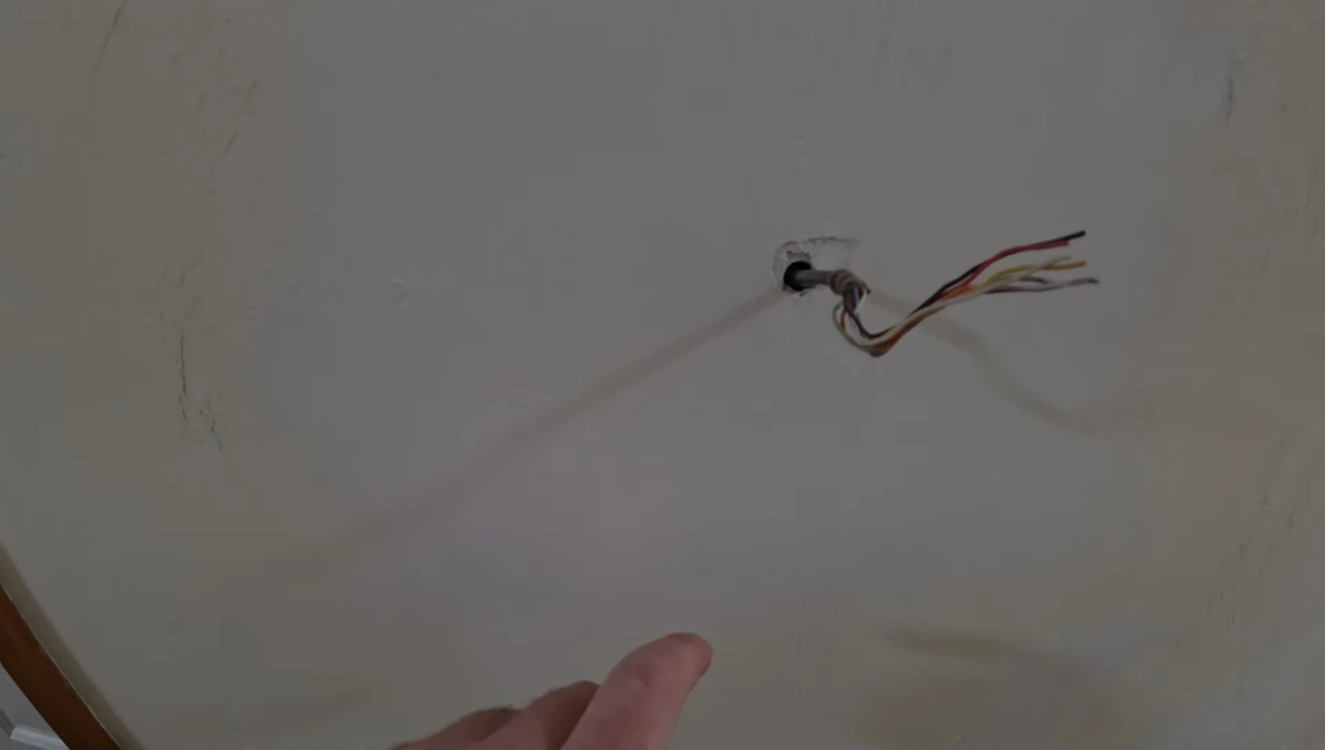 Installing a plywood backing plate for the new thermostat