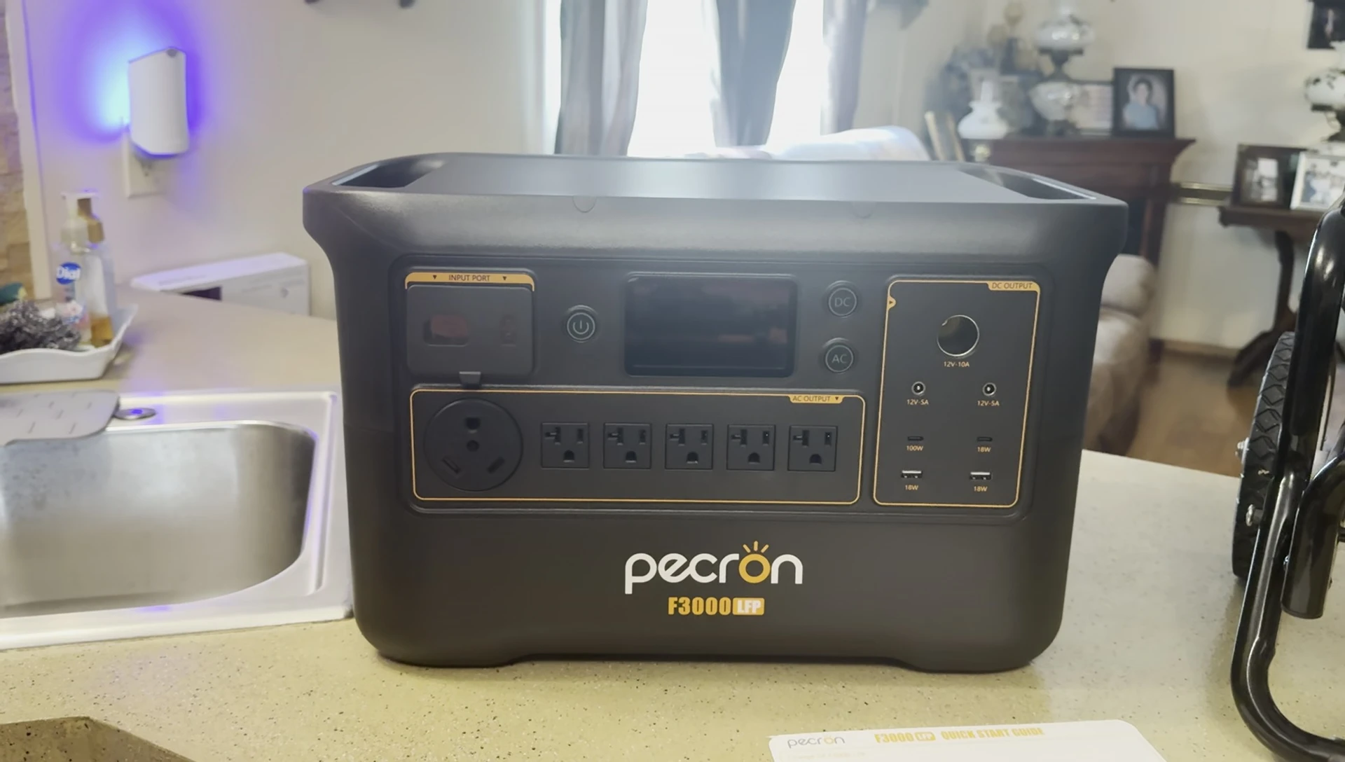 The Pecron F3000 LFP power station with its specifications displayed on the screen.