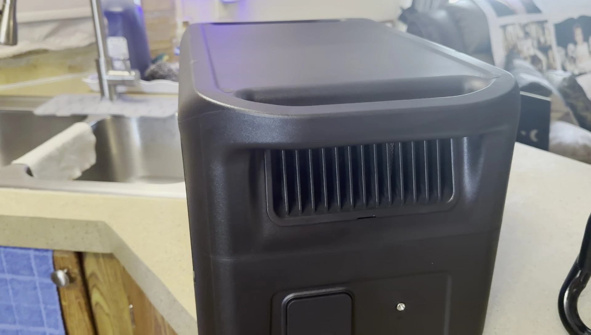 Demonstrating the easily removable vent filter.