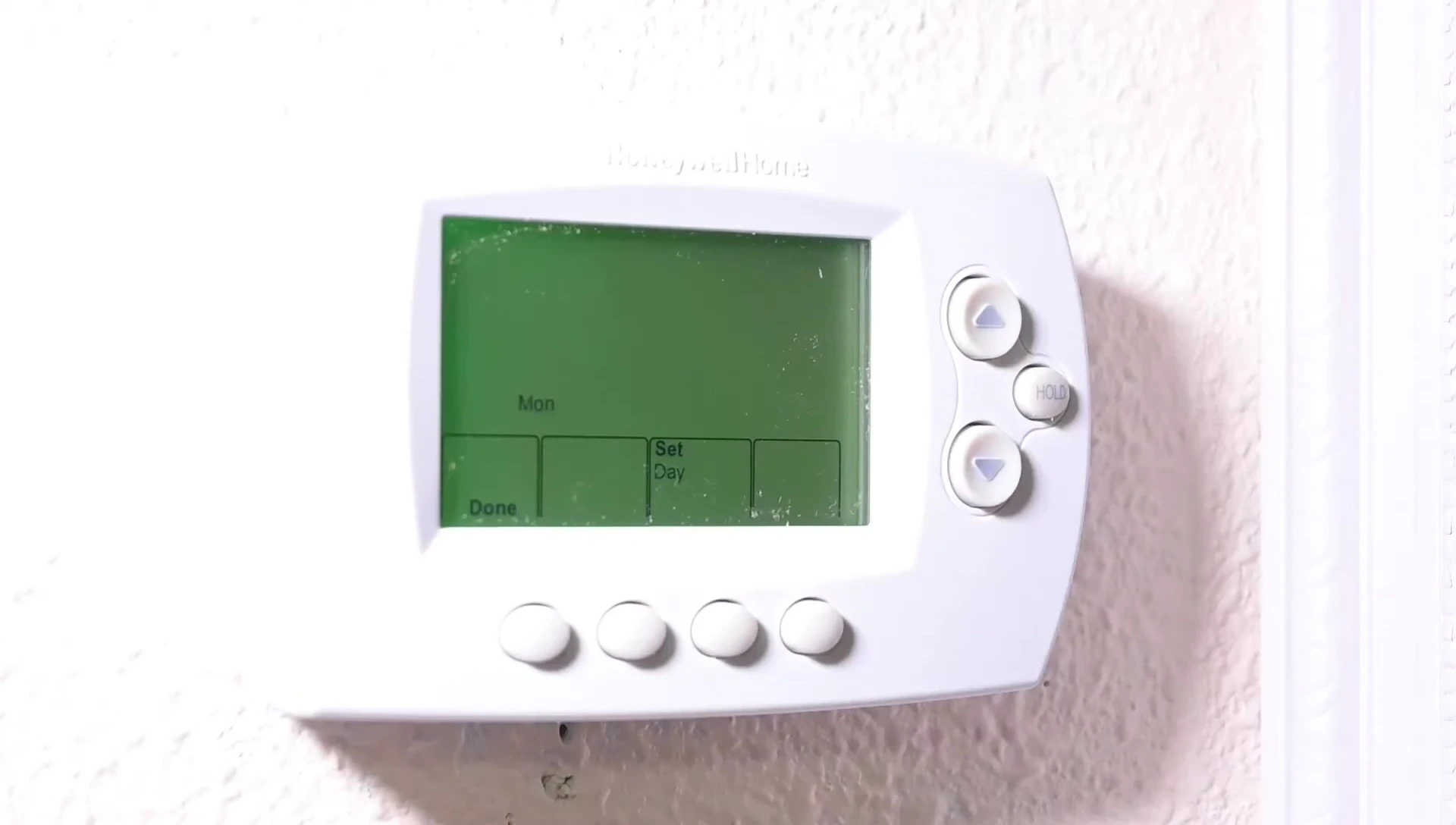 Setting the clock on the thermostat display