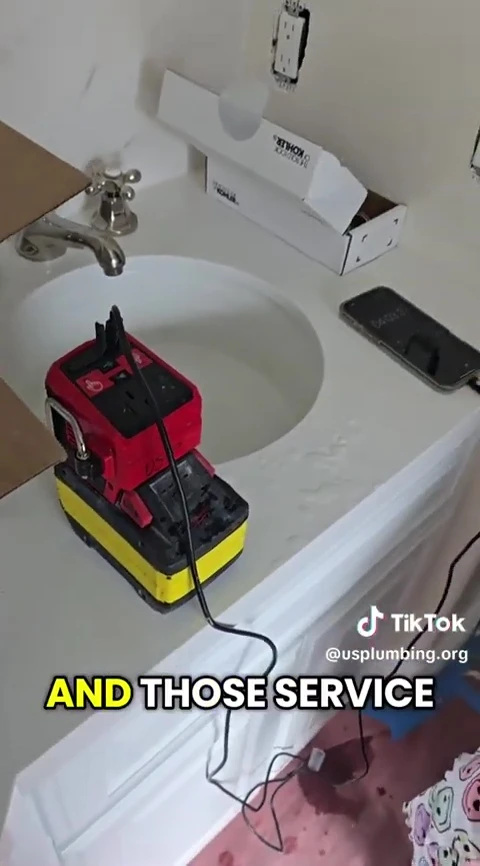 The speaker addressing common complaints from homeowners about tankless water heaters.