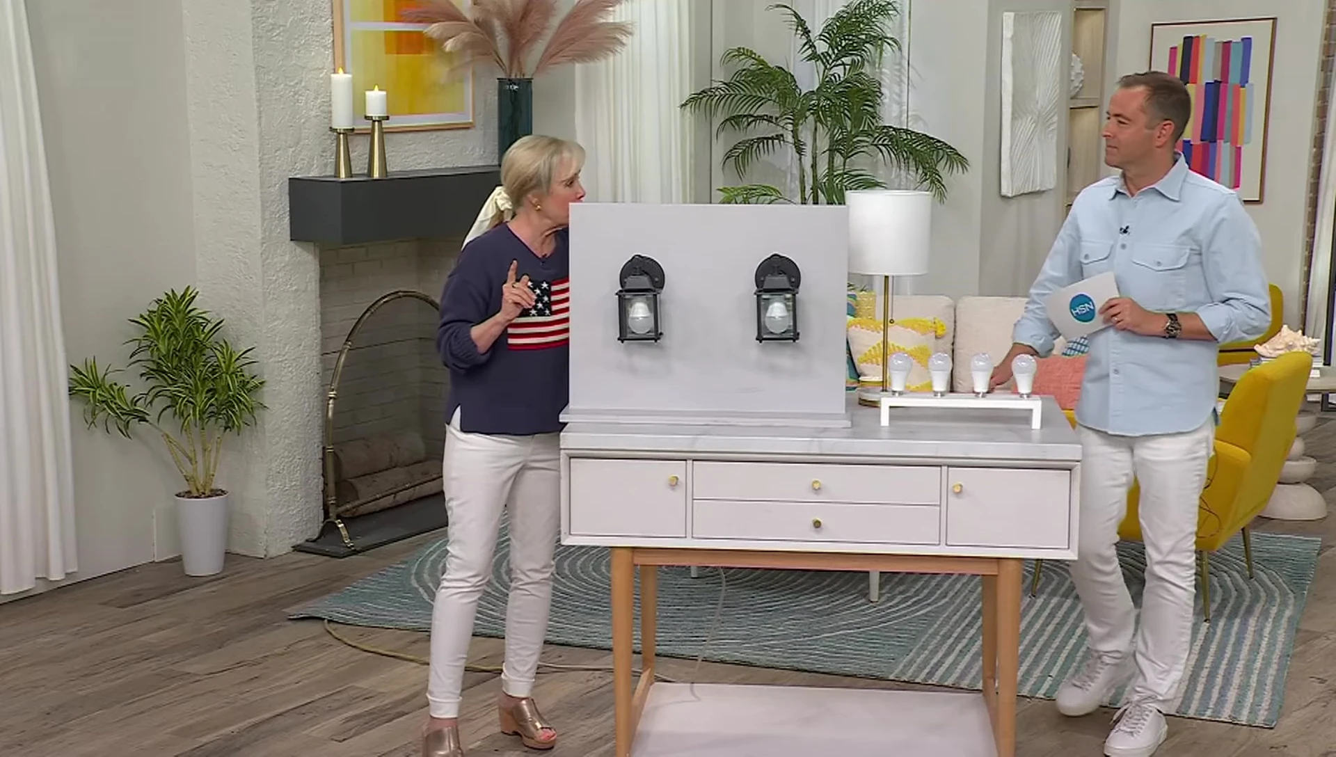 Presenter suggesting indoor uses for the bulbs