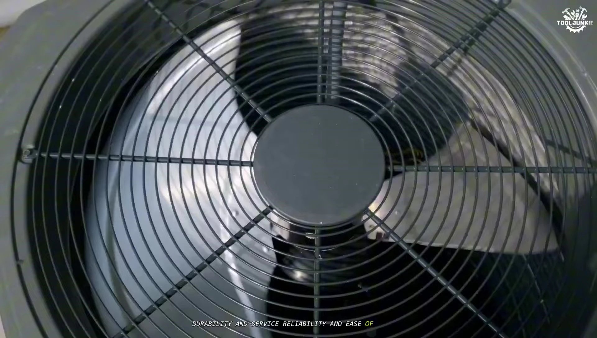 Image depicting a Carrier technician servicing an AC unit.