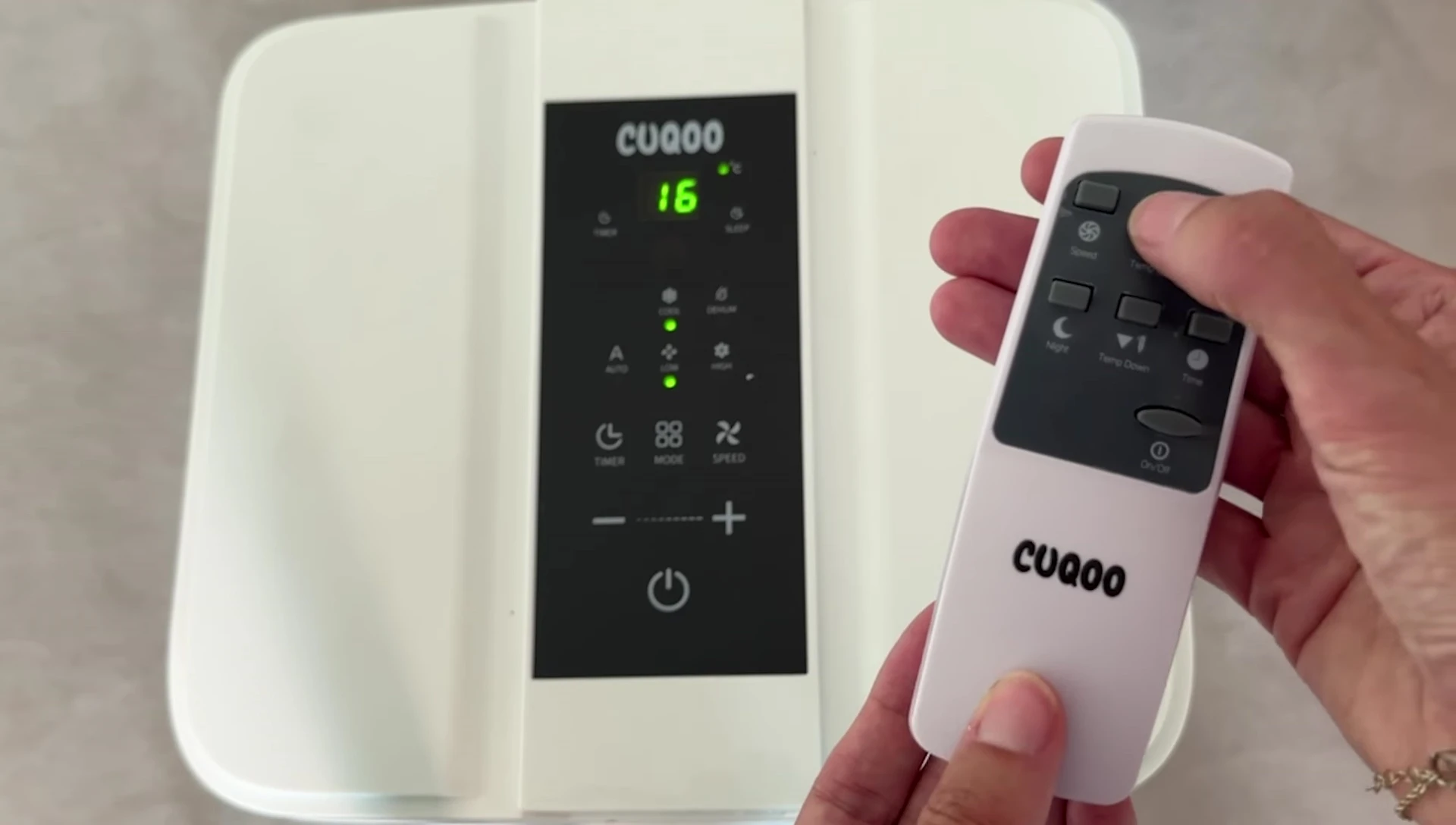 Temperature adjustment buttons shown