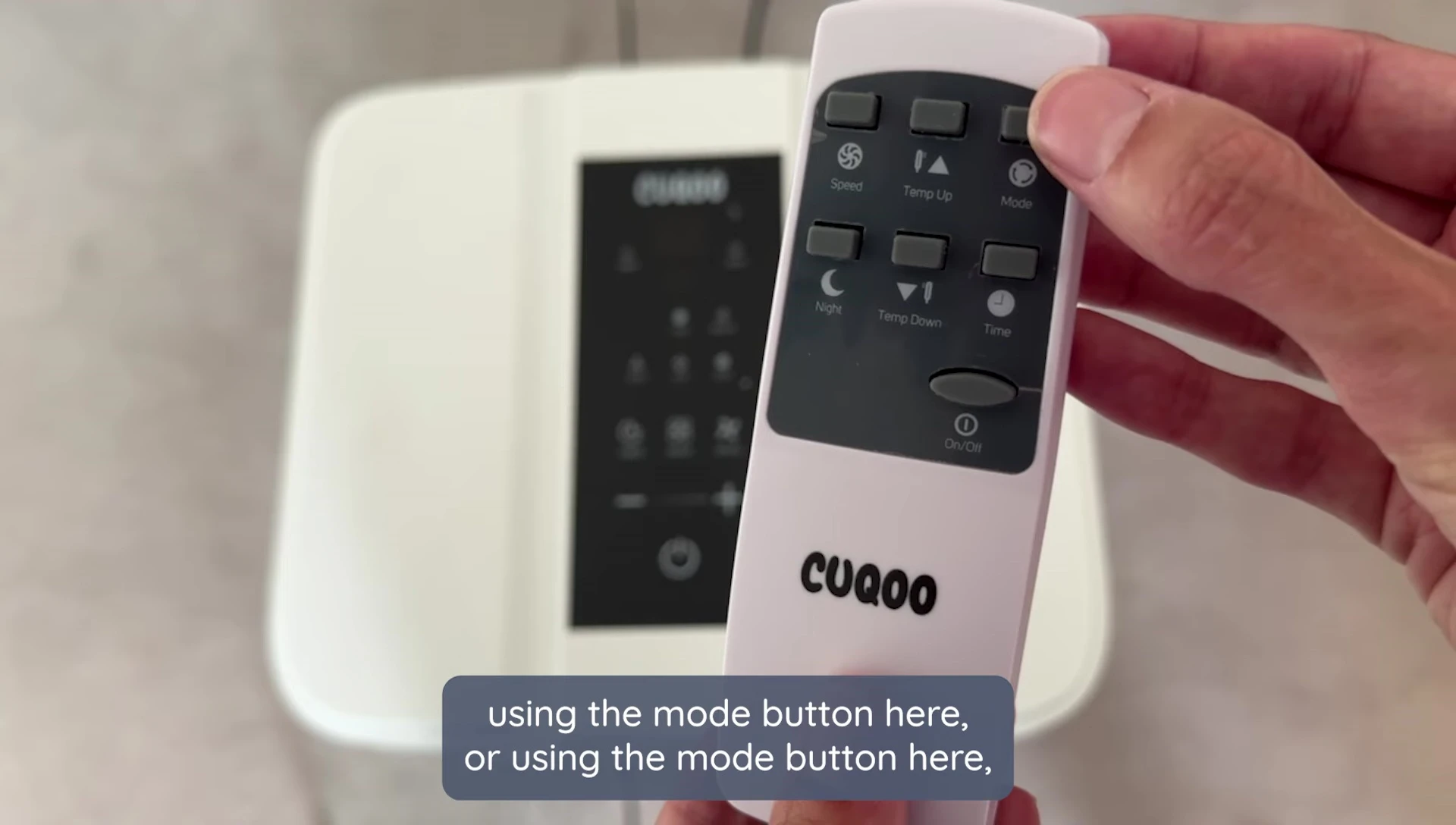 Close-up of the mode button on the unit
