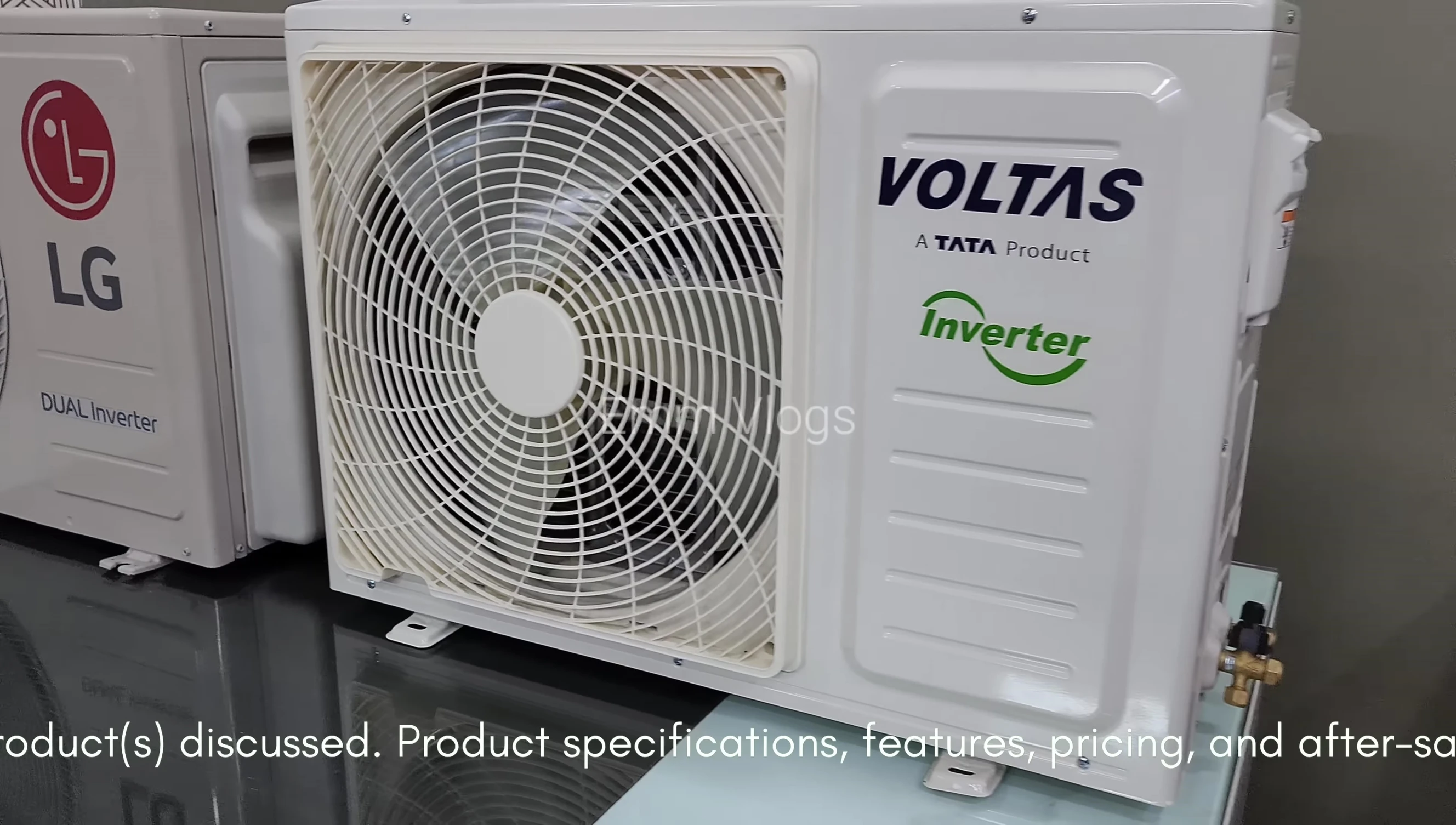 Voltas AC exterior showing the exposed copper pipes and square grill